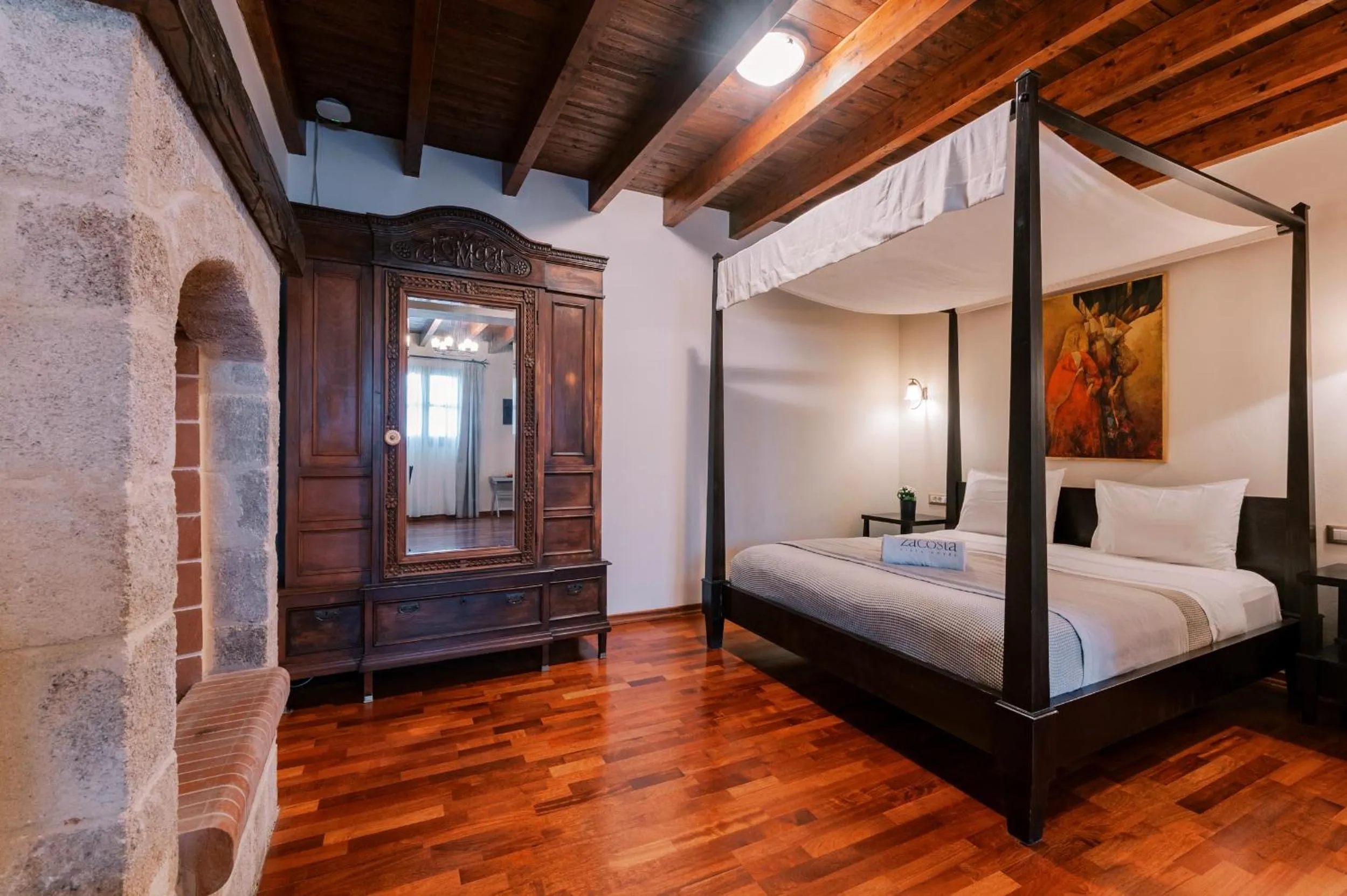 Bed in Zacosta Villa Hotel