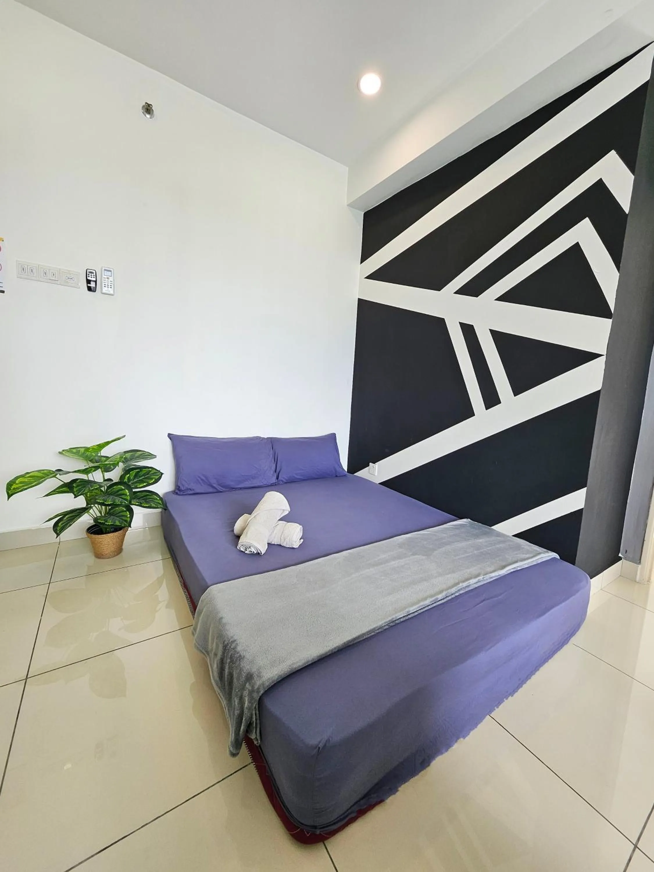 Bed in Mansion One by Sky Hive