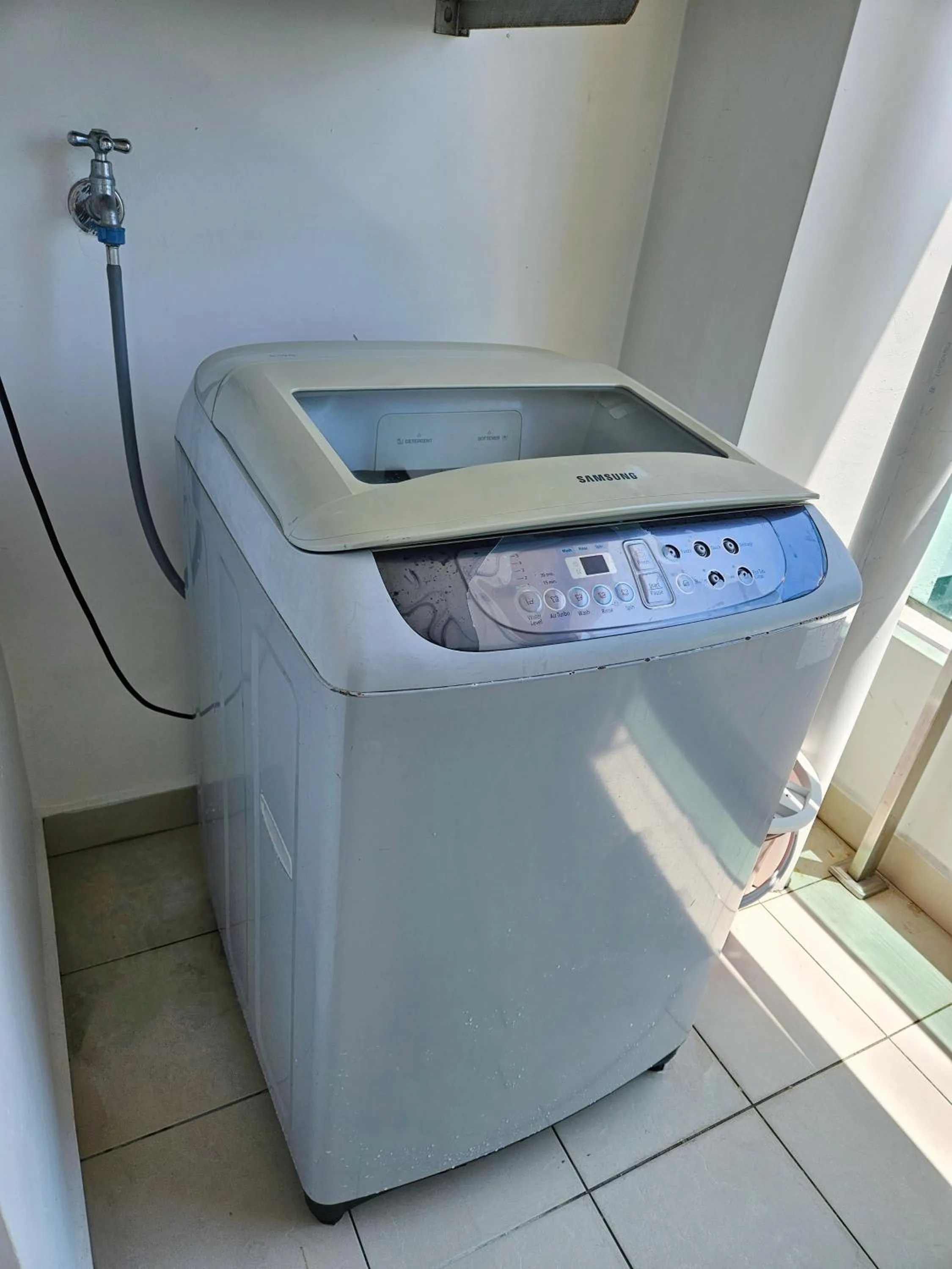 washing machine in Mansion One by Sky Hive