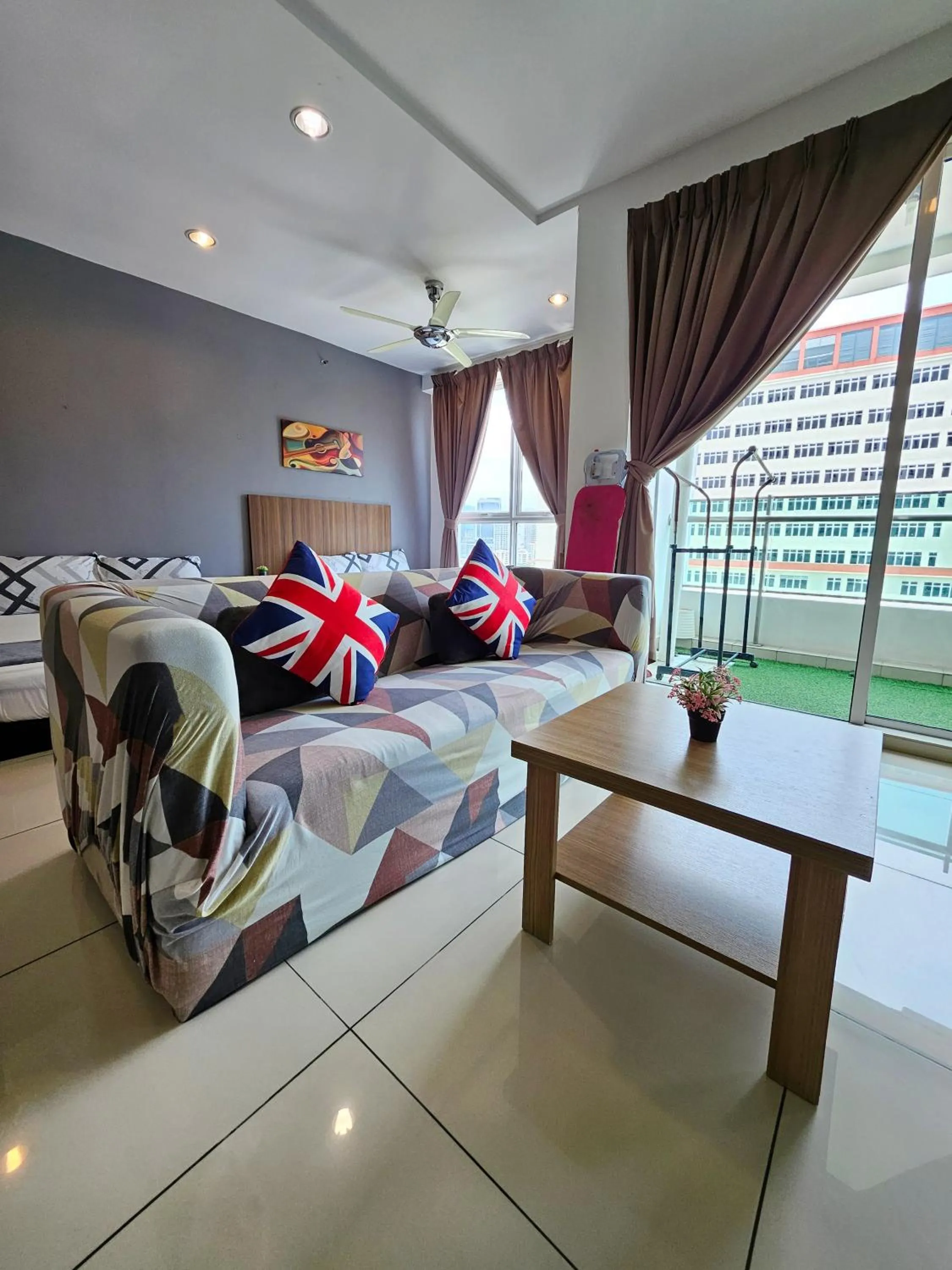 Living room in Mansion One by Sky Hive