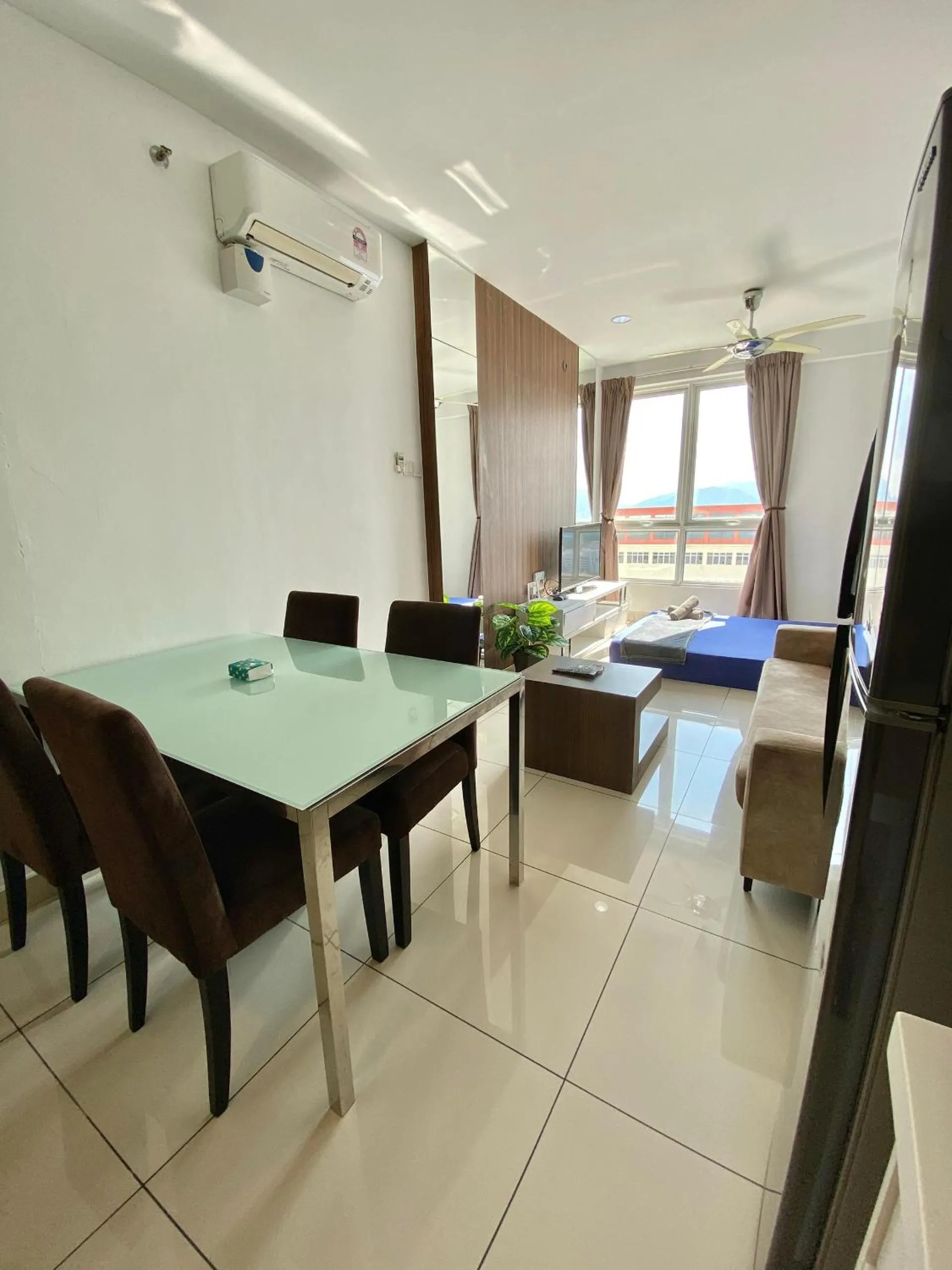 Living room in Mansion One by Sky Hive