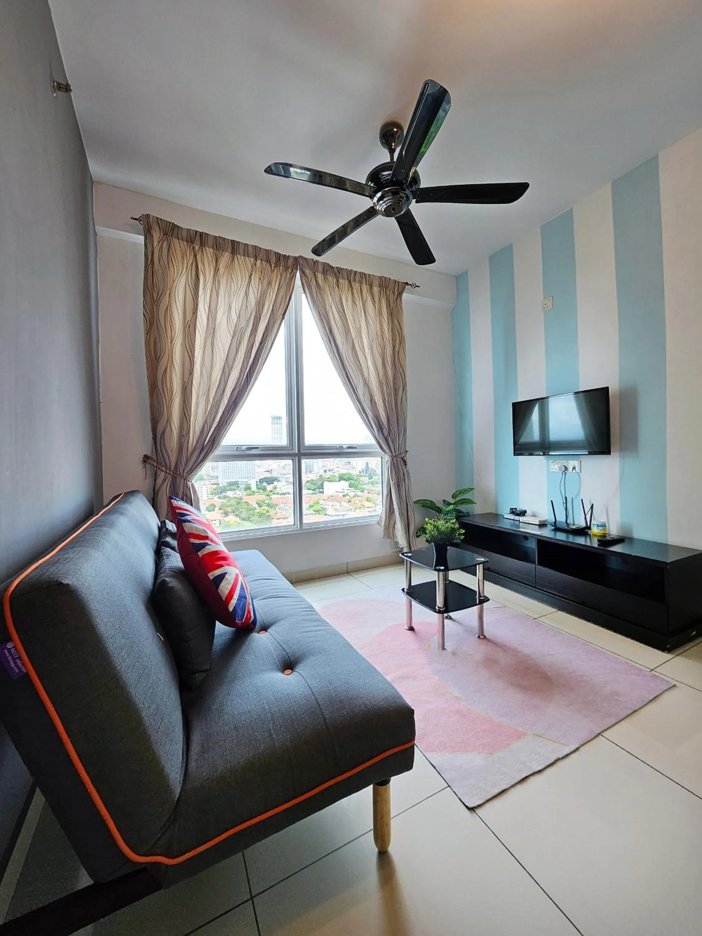 Living room in Mansion One by Sky Hive