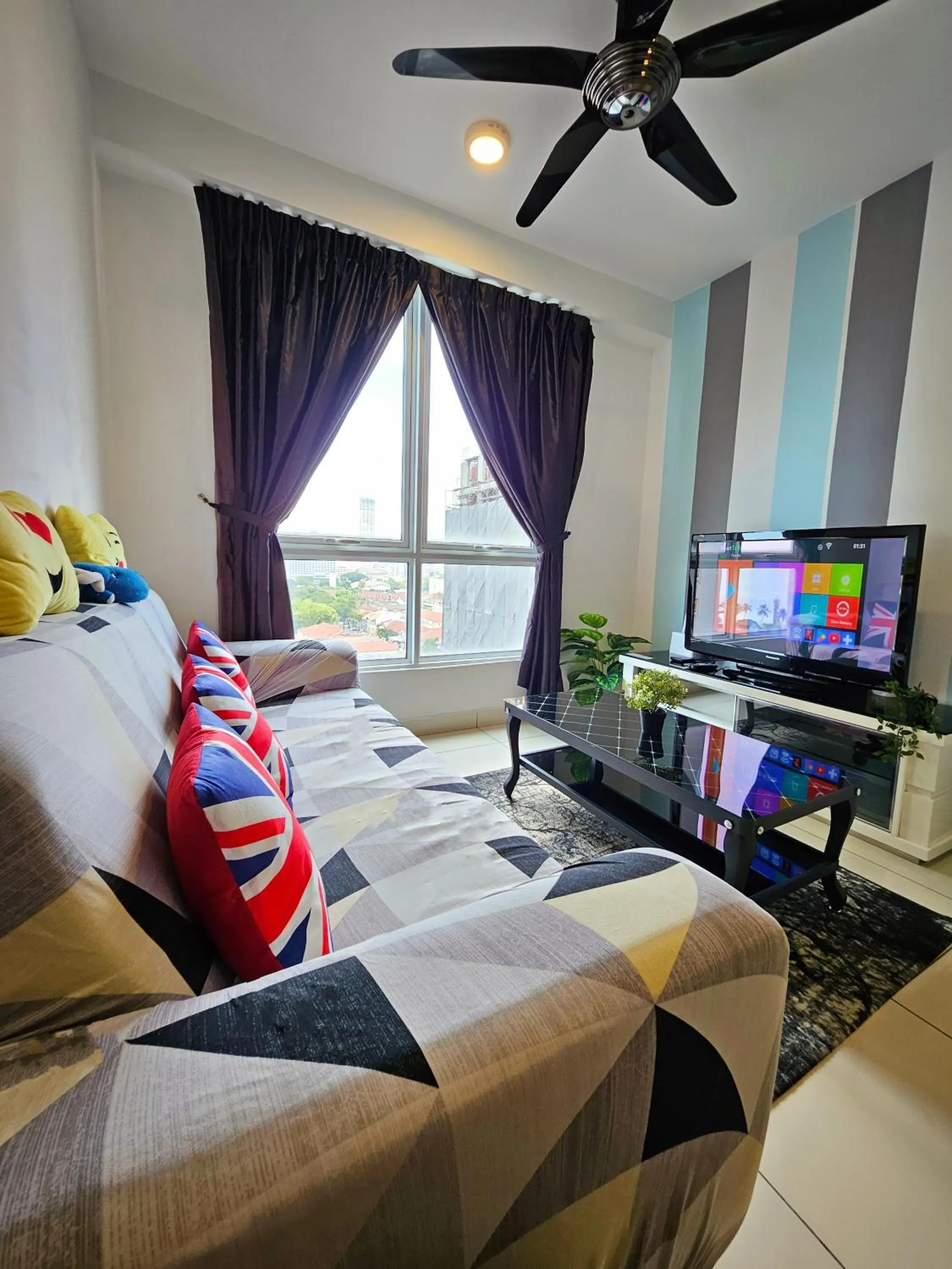 Living room in Mansion One by Sky Hive