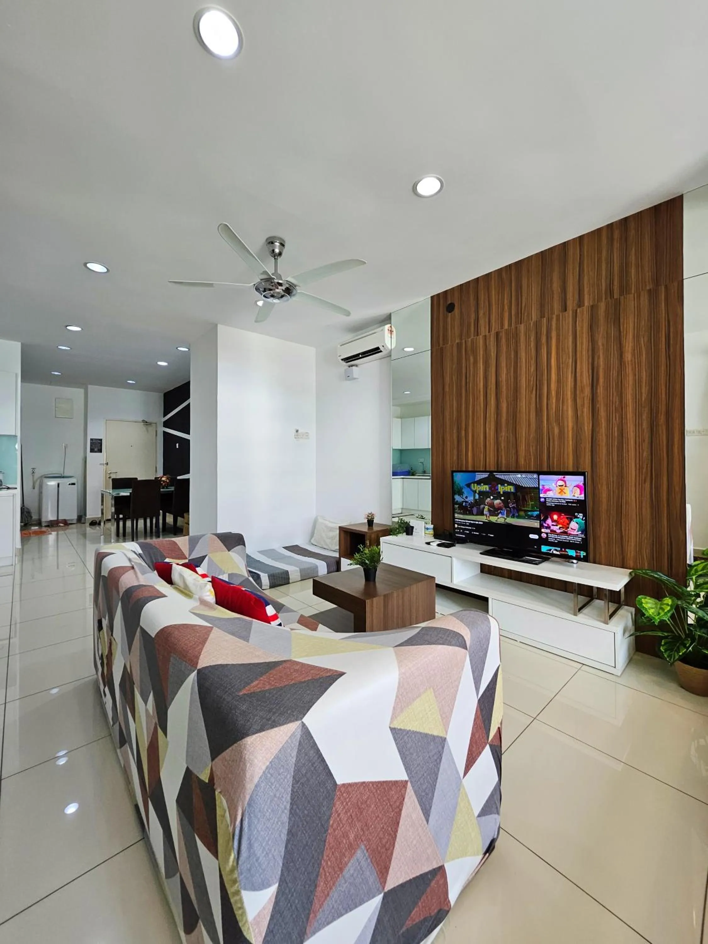 Living room in Mansion One by Sky Hive