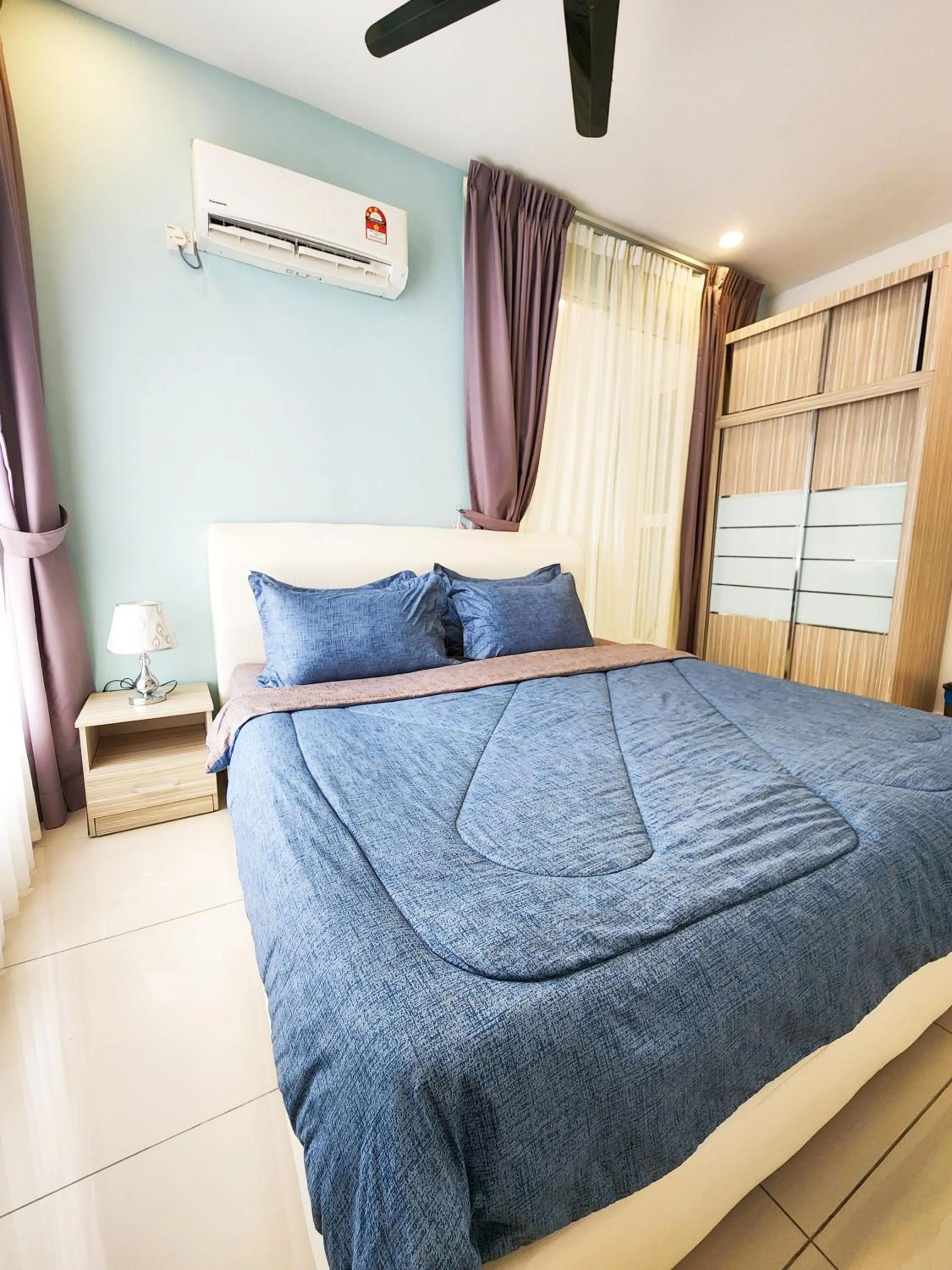 Bed in Mansion One by Sky Hive