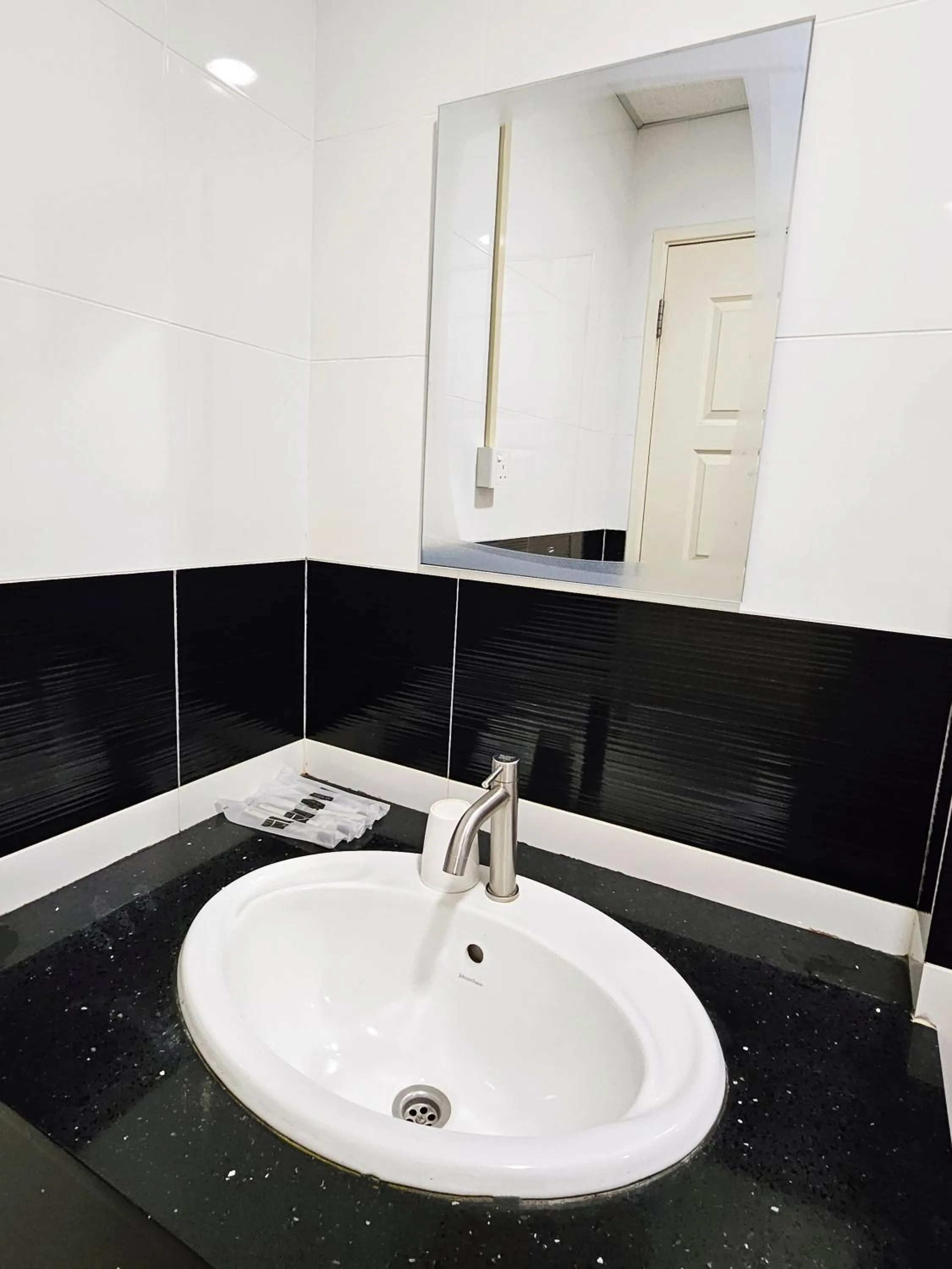 Bathroom in Mansion One by Sky Hive