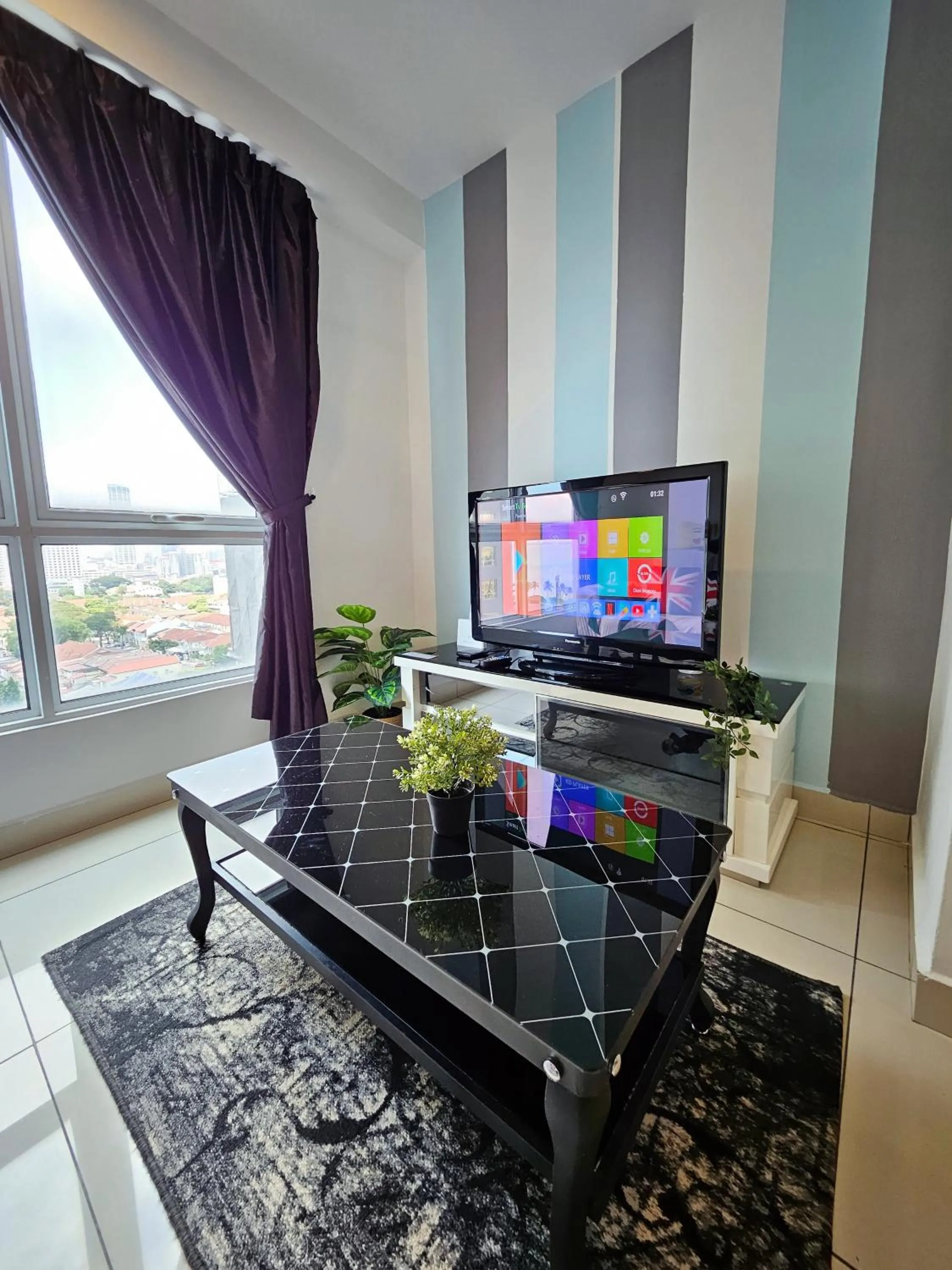 Living room in Mansion One by Sky Hive