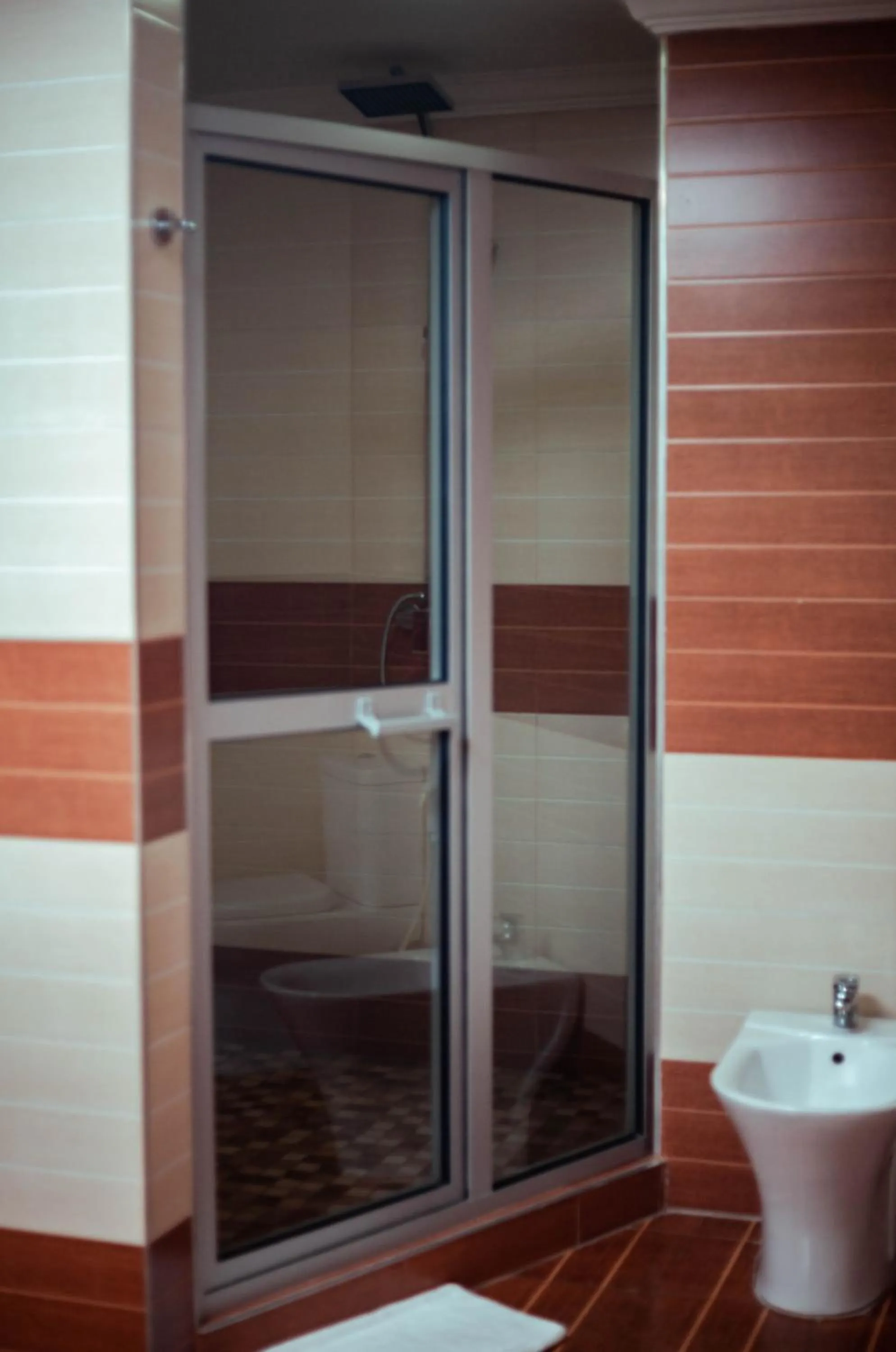 Shower in Crossroads Hotel Blantyre