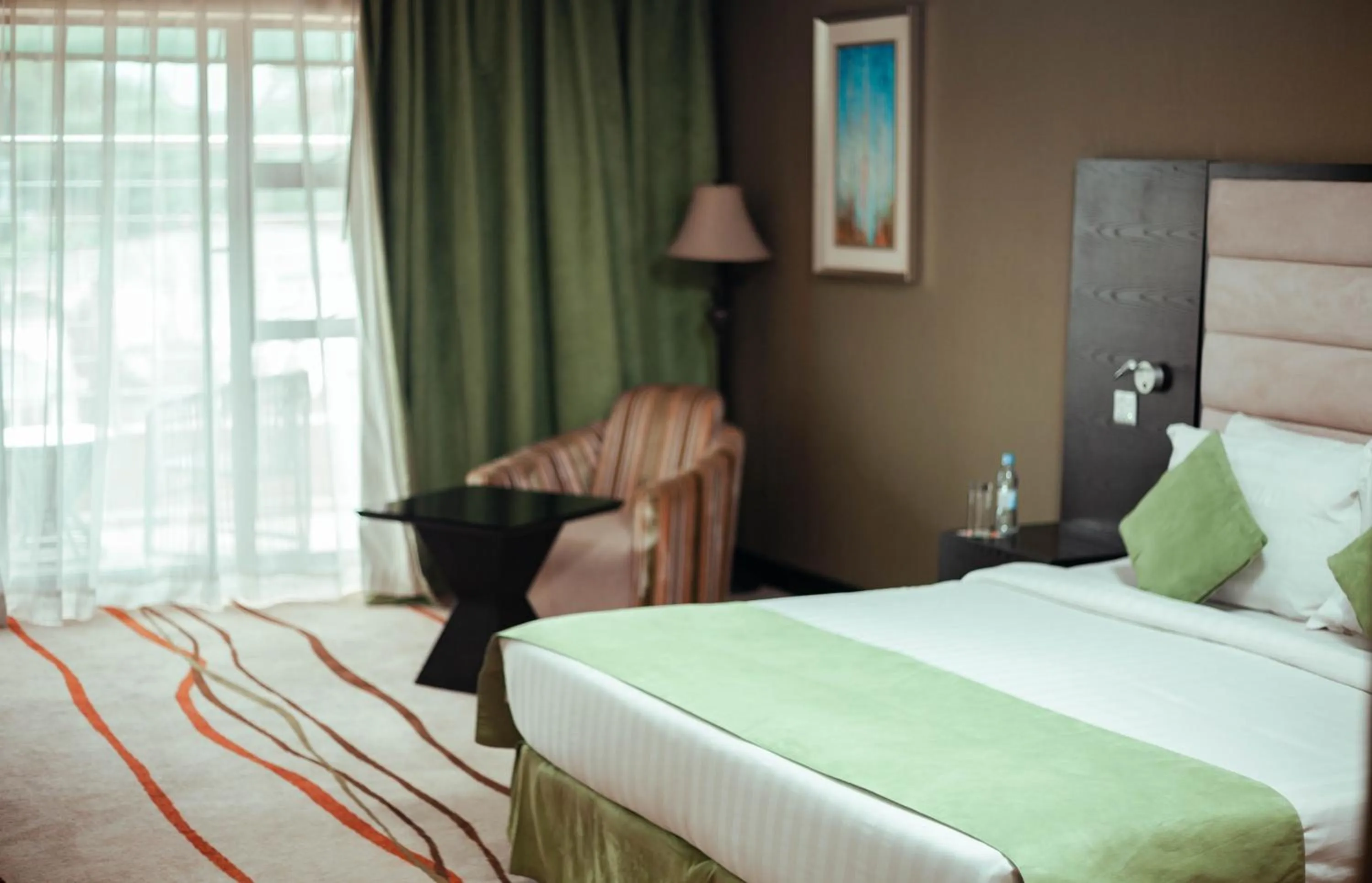 Seating area in Crossroads Hotel Blantyre