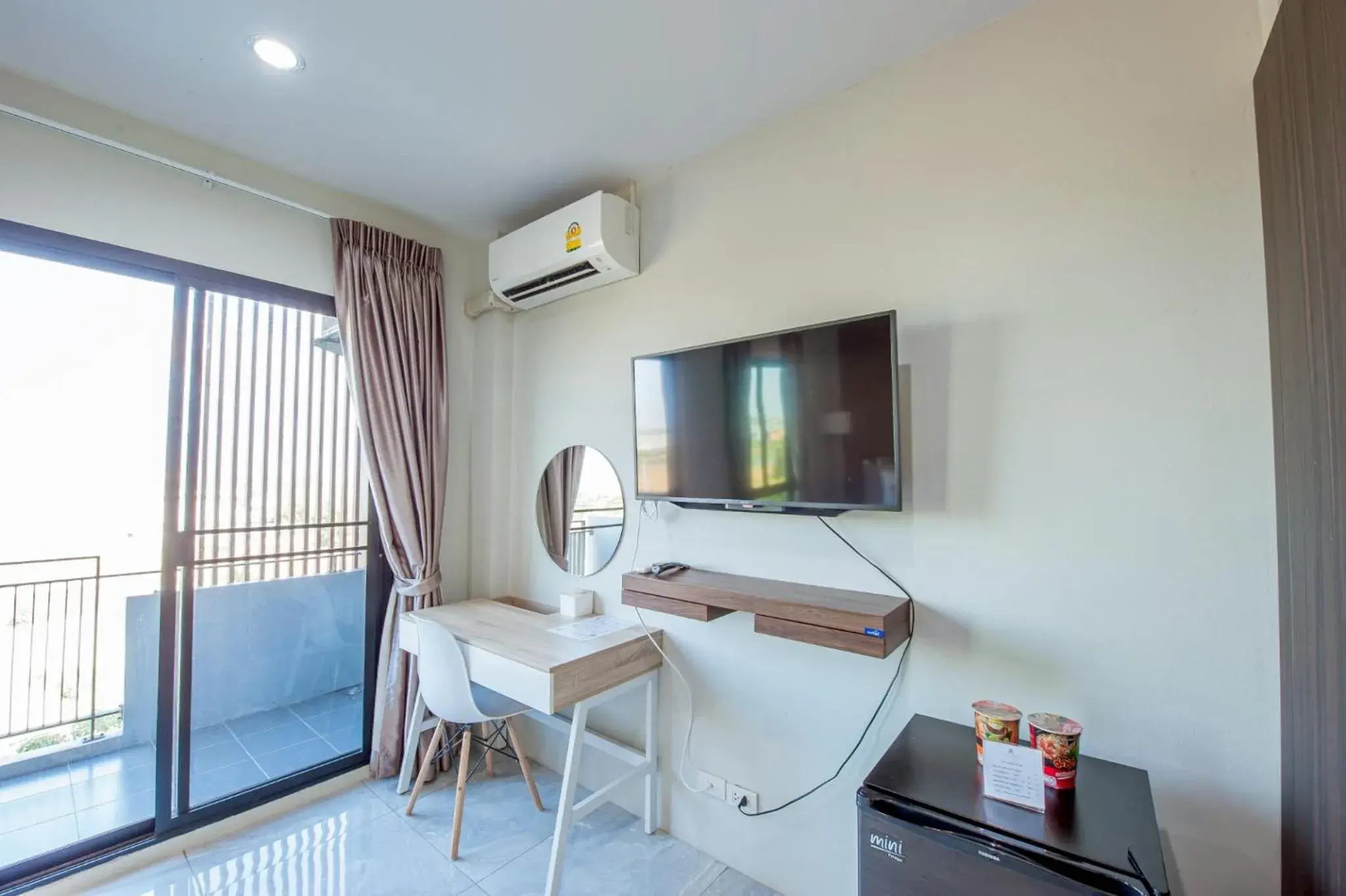 TV and multimedia in The Living Hotel SamutPrakan TV and multimedia in The Living Hotel SamutPrakan