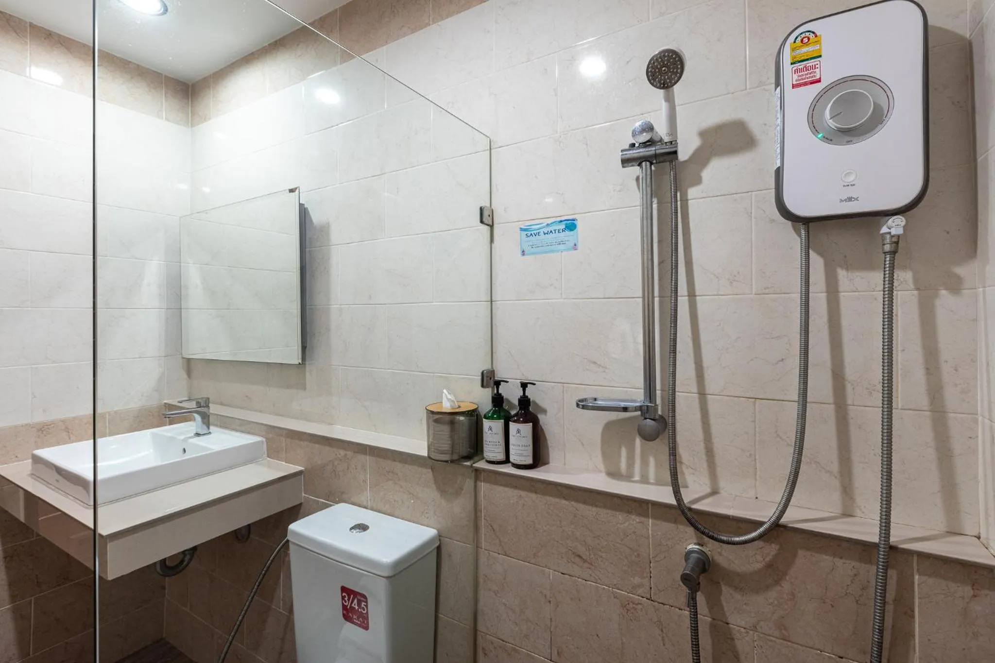 Shower in The Living Hotel SamutPrakan