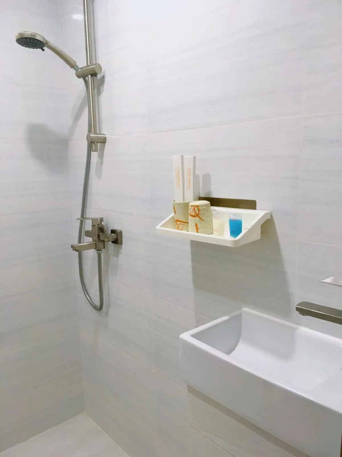 Shower in Whole Sunshine International Guest House