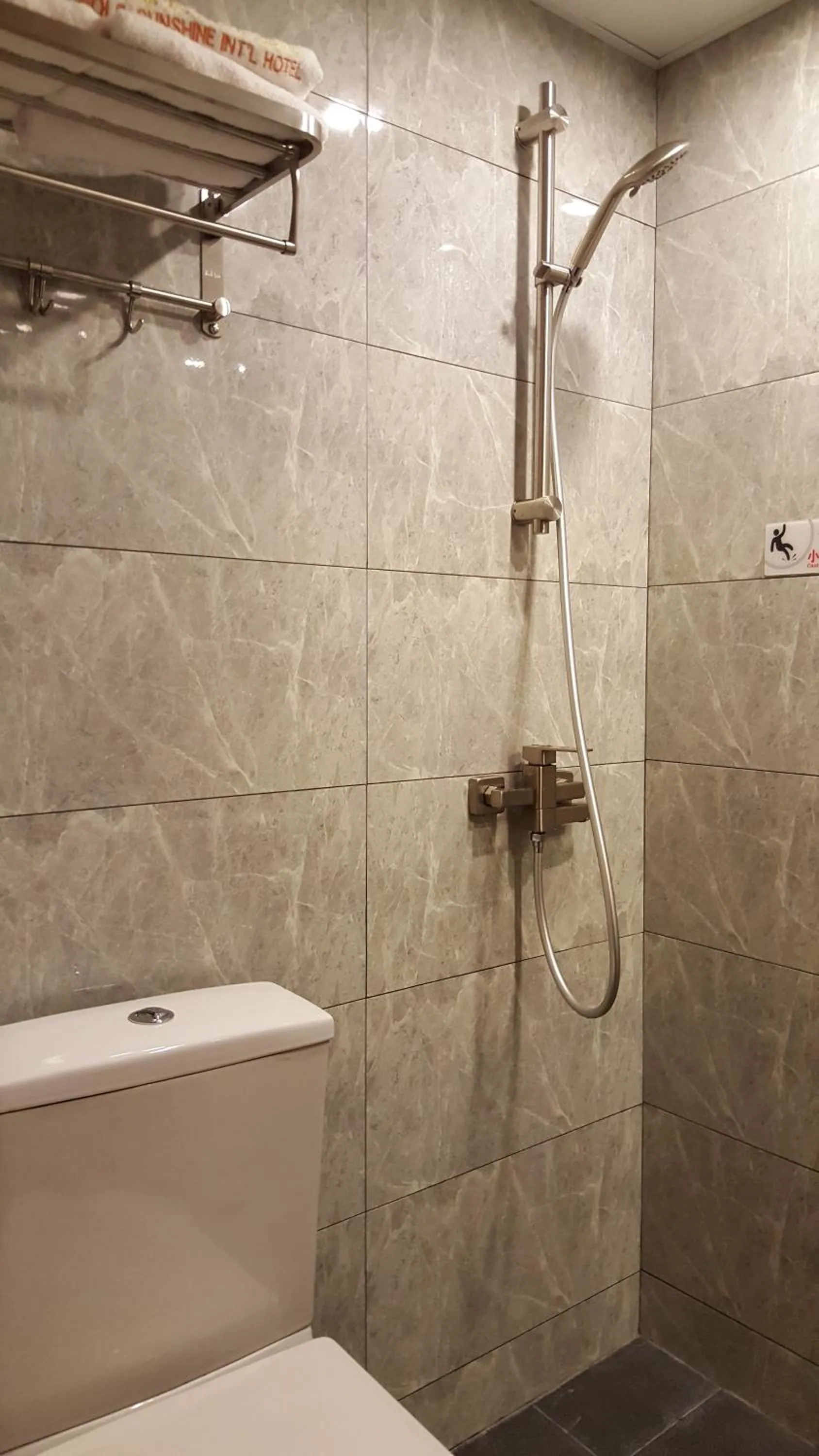 Shower in Whole Sunshine International Guest House