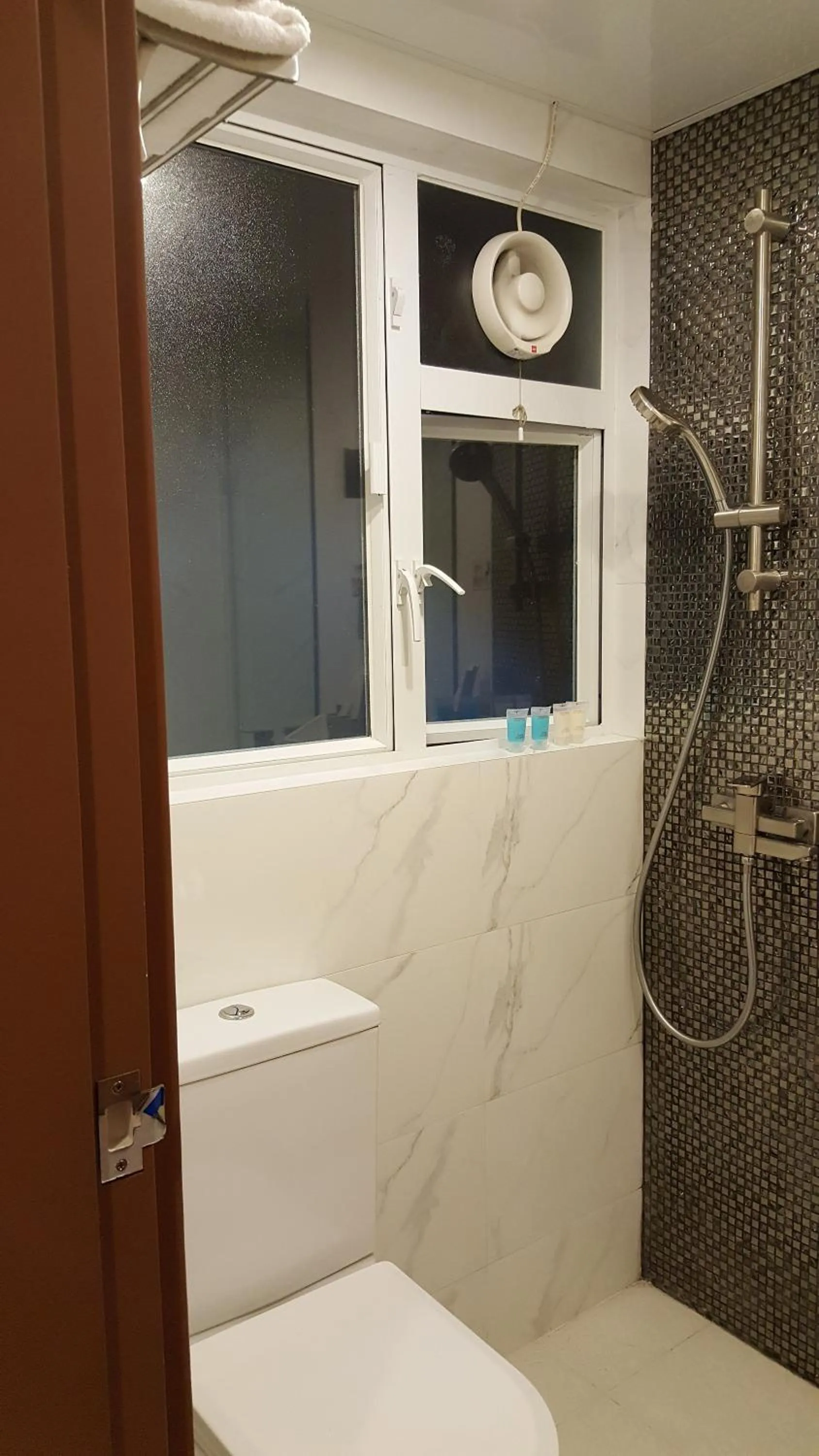 Shower in Whole Sunshine International Guest House