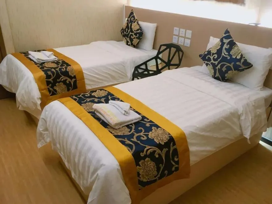 Bed in Whole Sunshine International Guest House