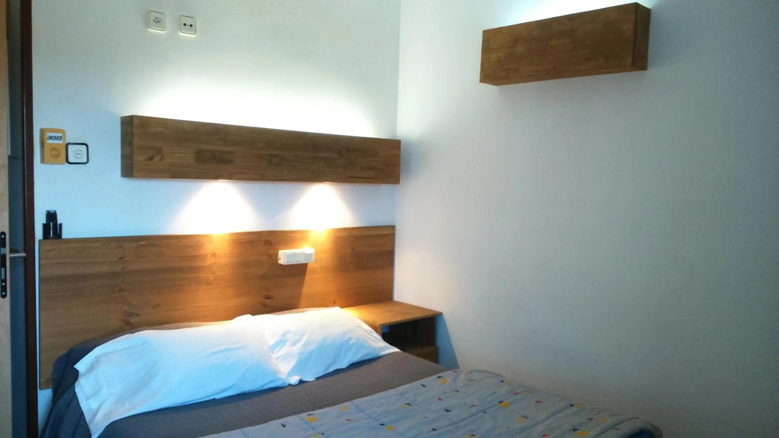 Photo of the whole room, Bed in La Masia