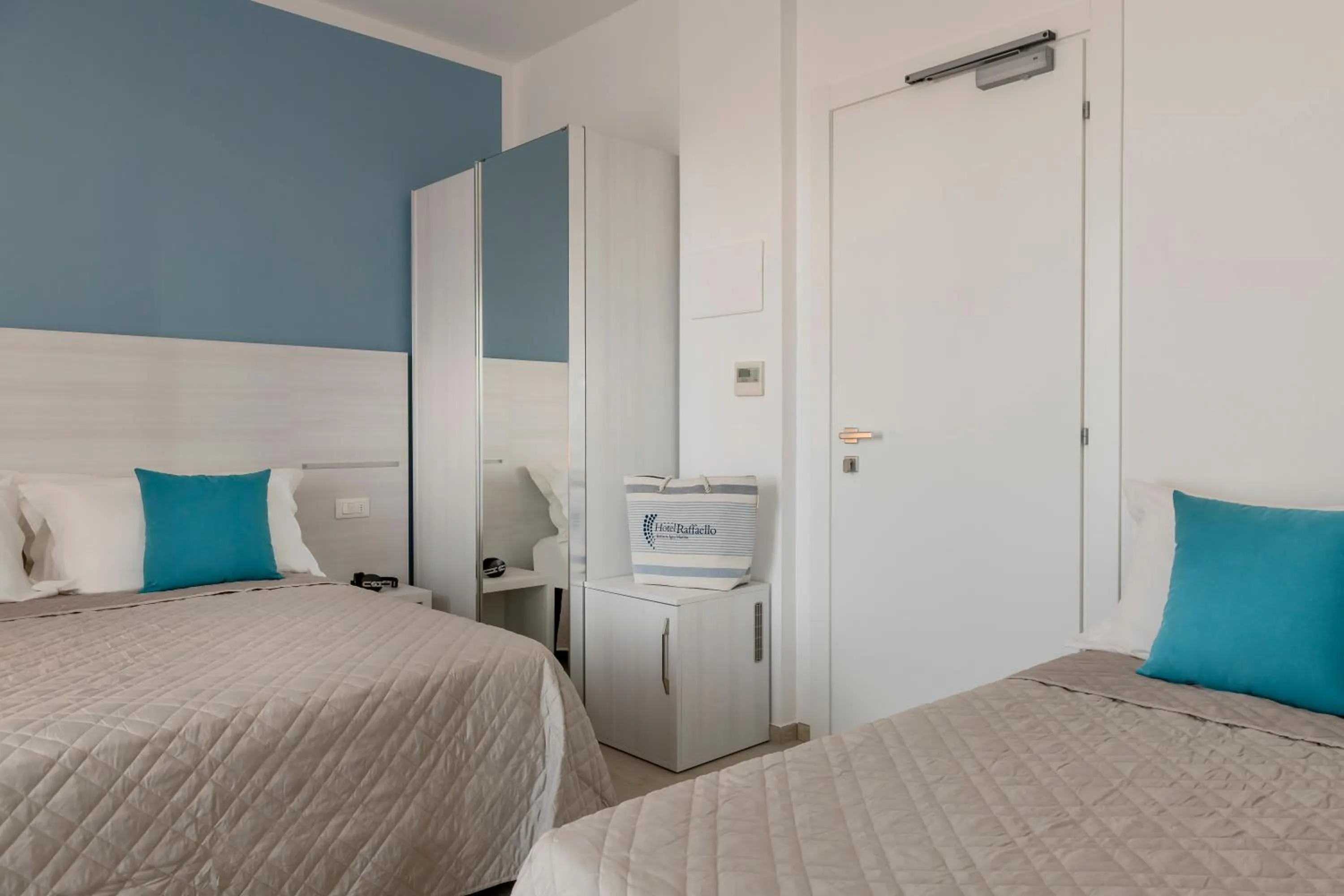 Bed in Hotel Raffaello