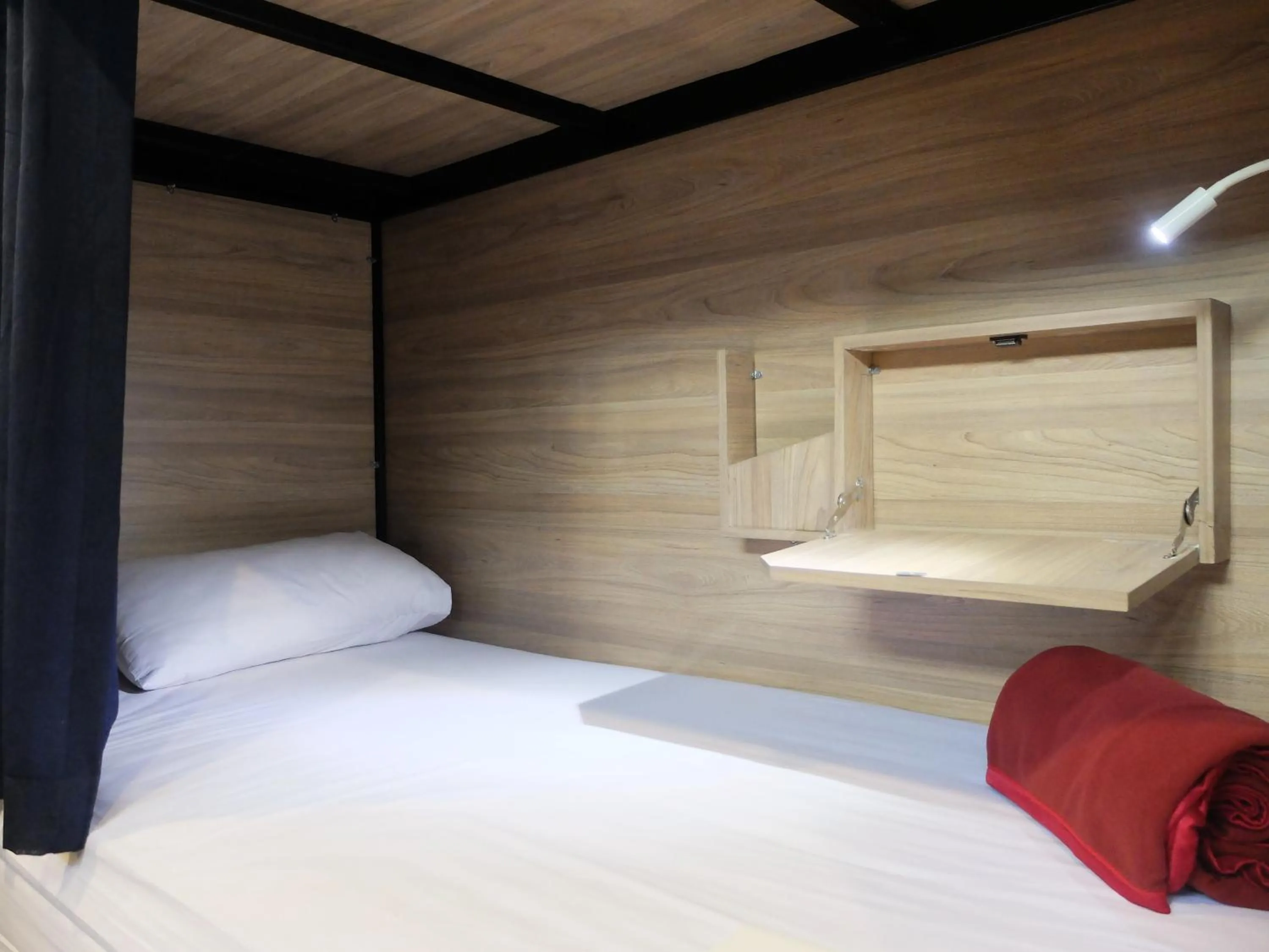 Bed in Kapal Garden Hotel at Rekreasi Sengkaling