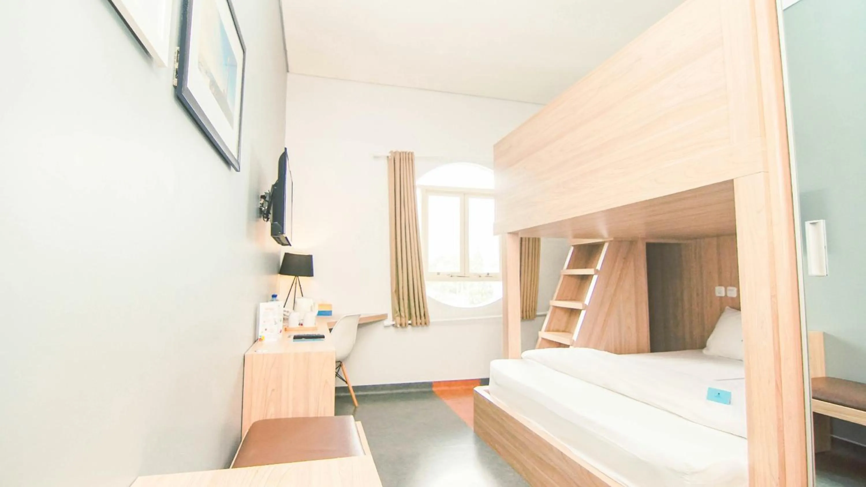 Bed in Kapal Garden Hotel at Rekreasi Sengkaling