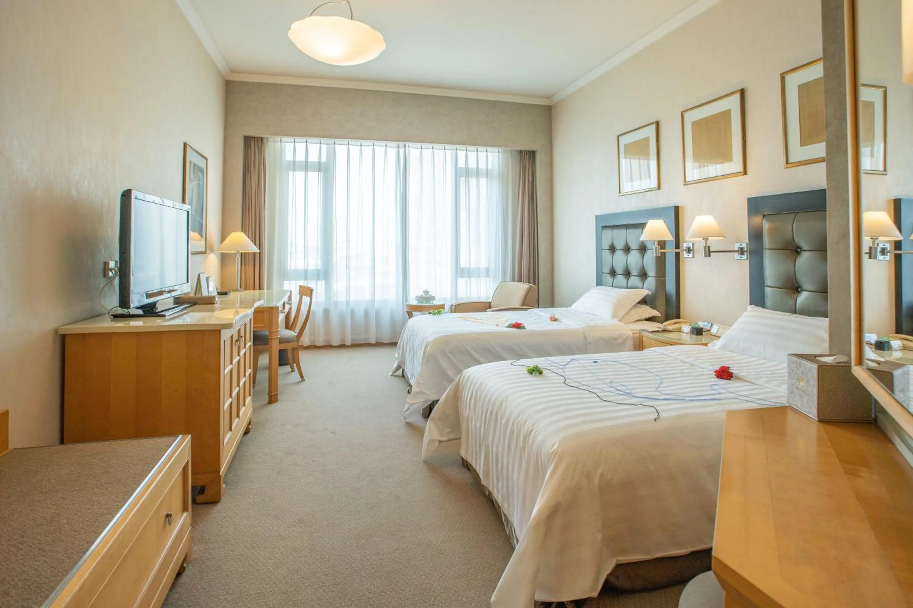 Bedroom, Bed in Shantou Junhua Haiyi Hotel