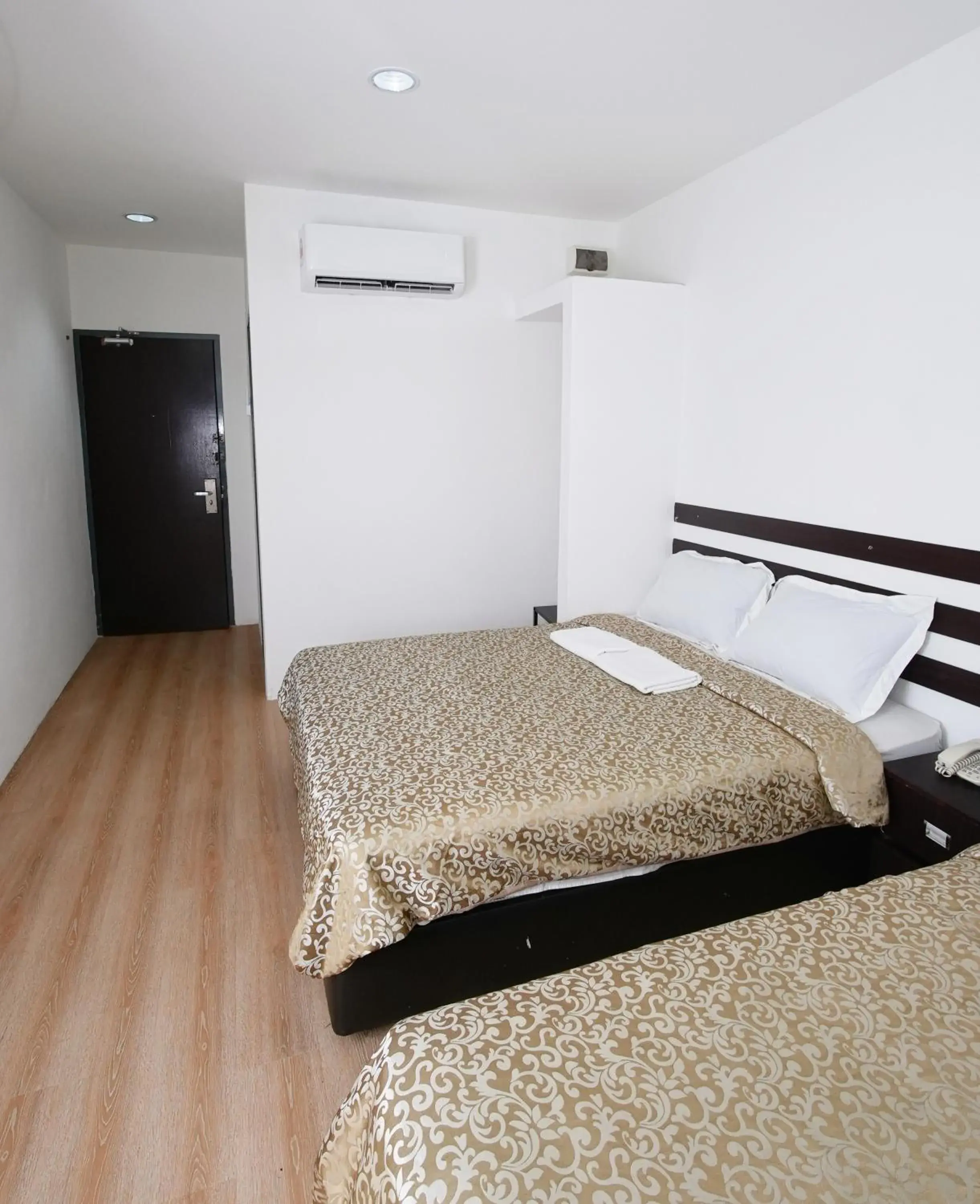 Standard Quadruple Room in Grand Inn Hotel - Macalister Road Standard Quadruple Room in Grand Inn Hotel - Macalister Road