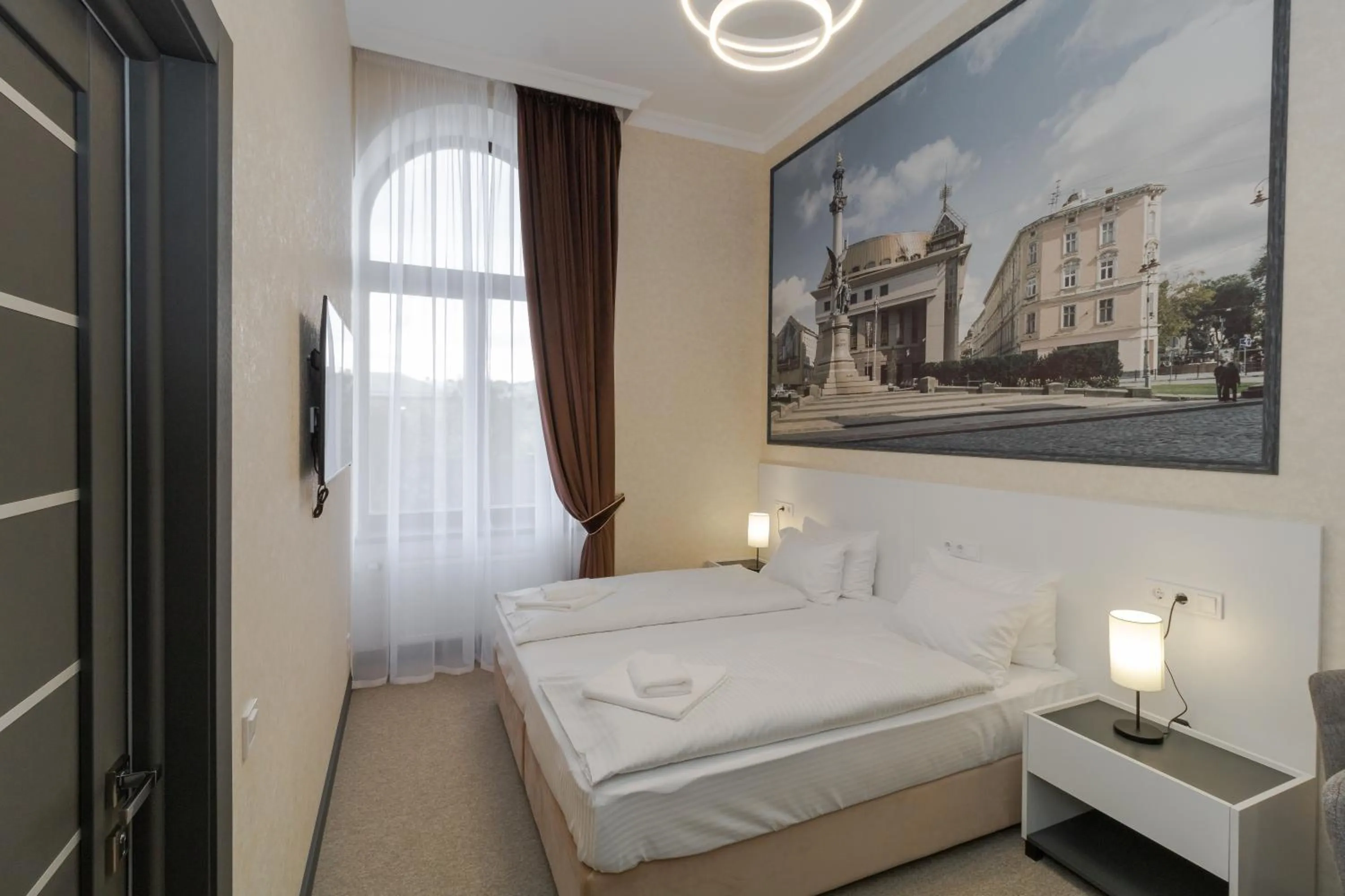 Photo of the whole room, Bed in Opera Passage Hotel & Apartments