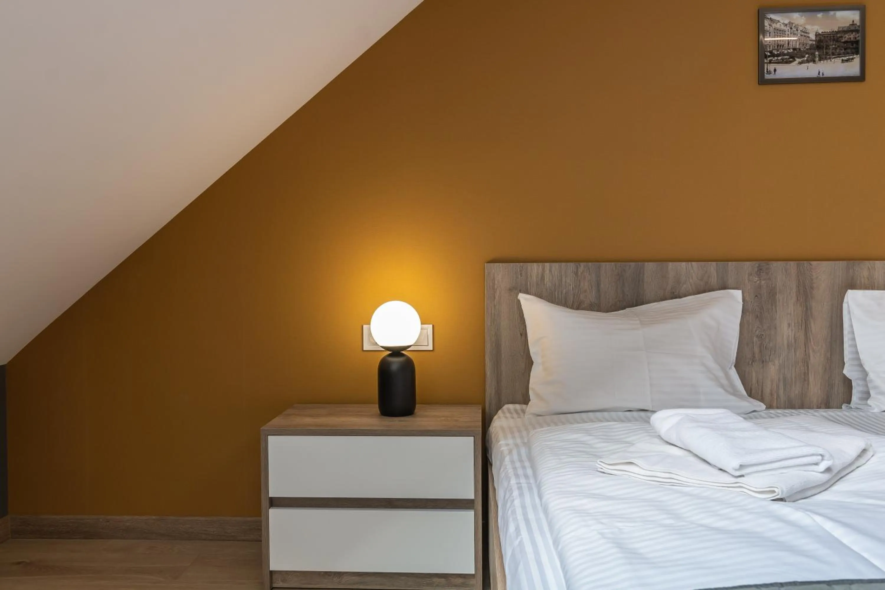 Bed in Opera Passage Hotel & Apartments