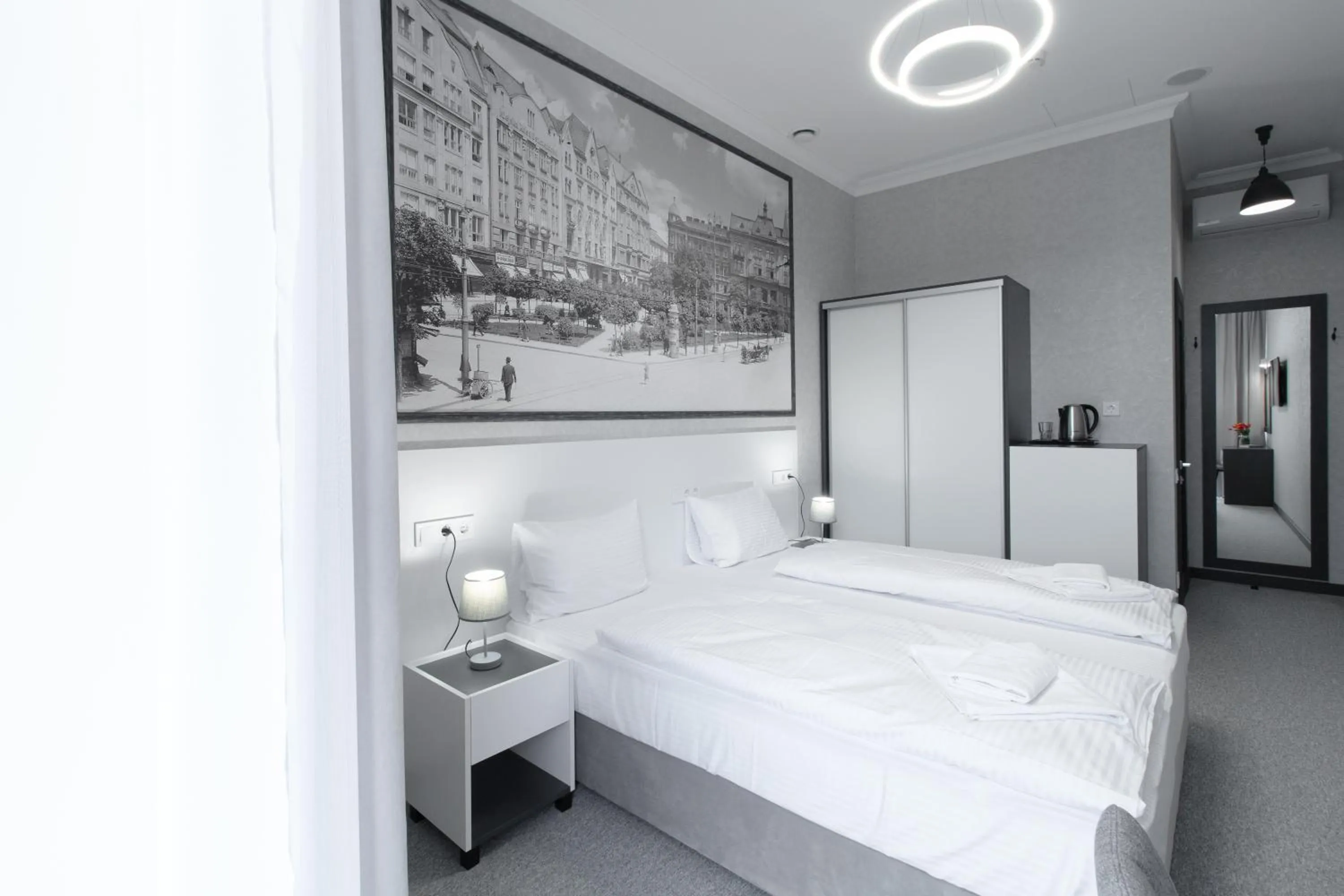 Bed in Opera Passage Hotel & Apartments