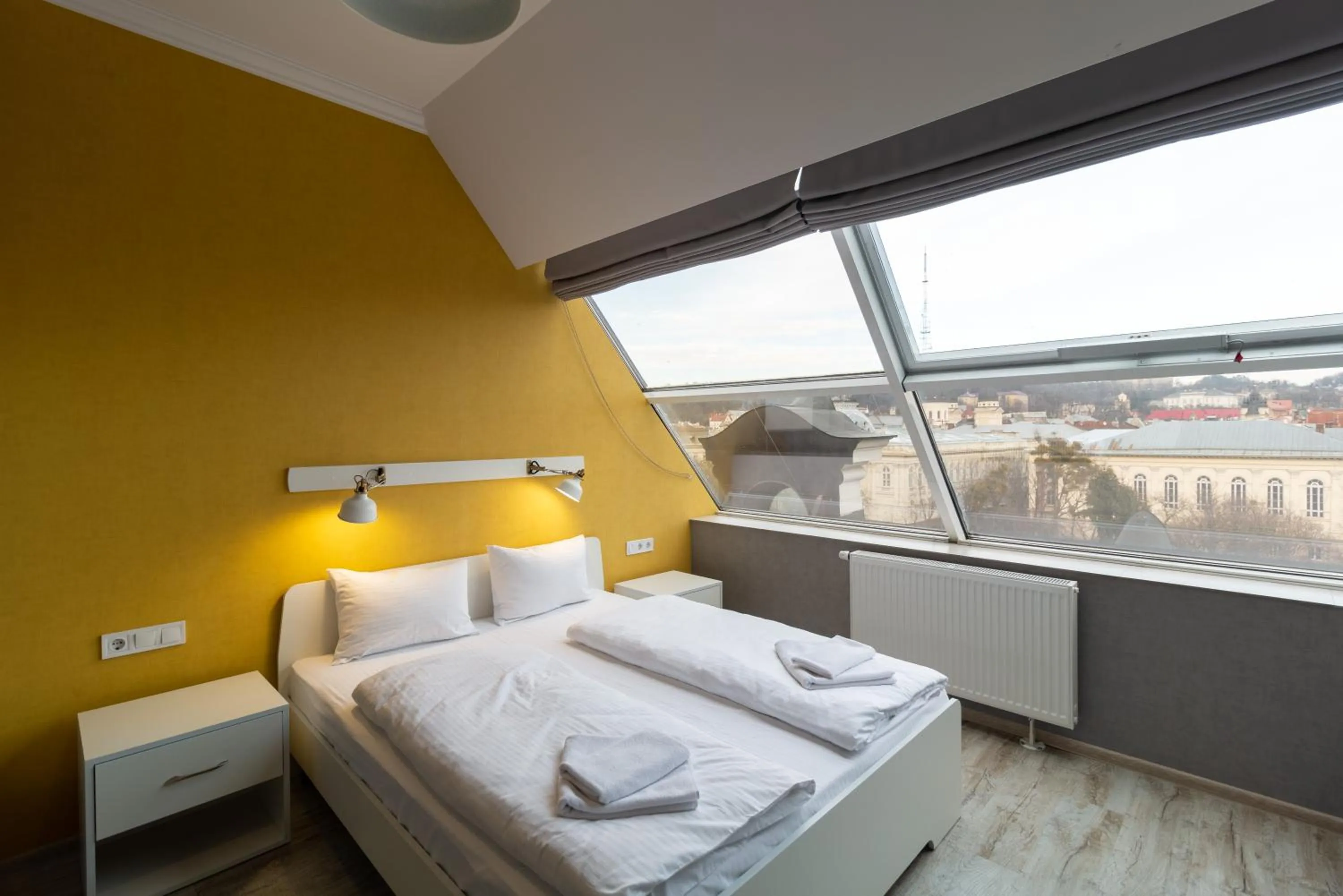 Bed in Opera Passage Hotel & Apartments