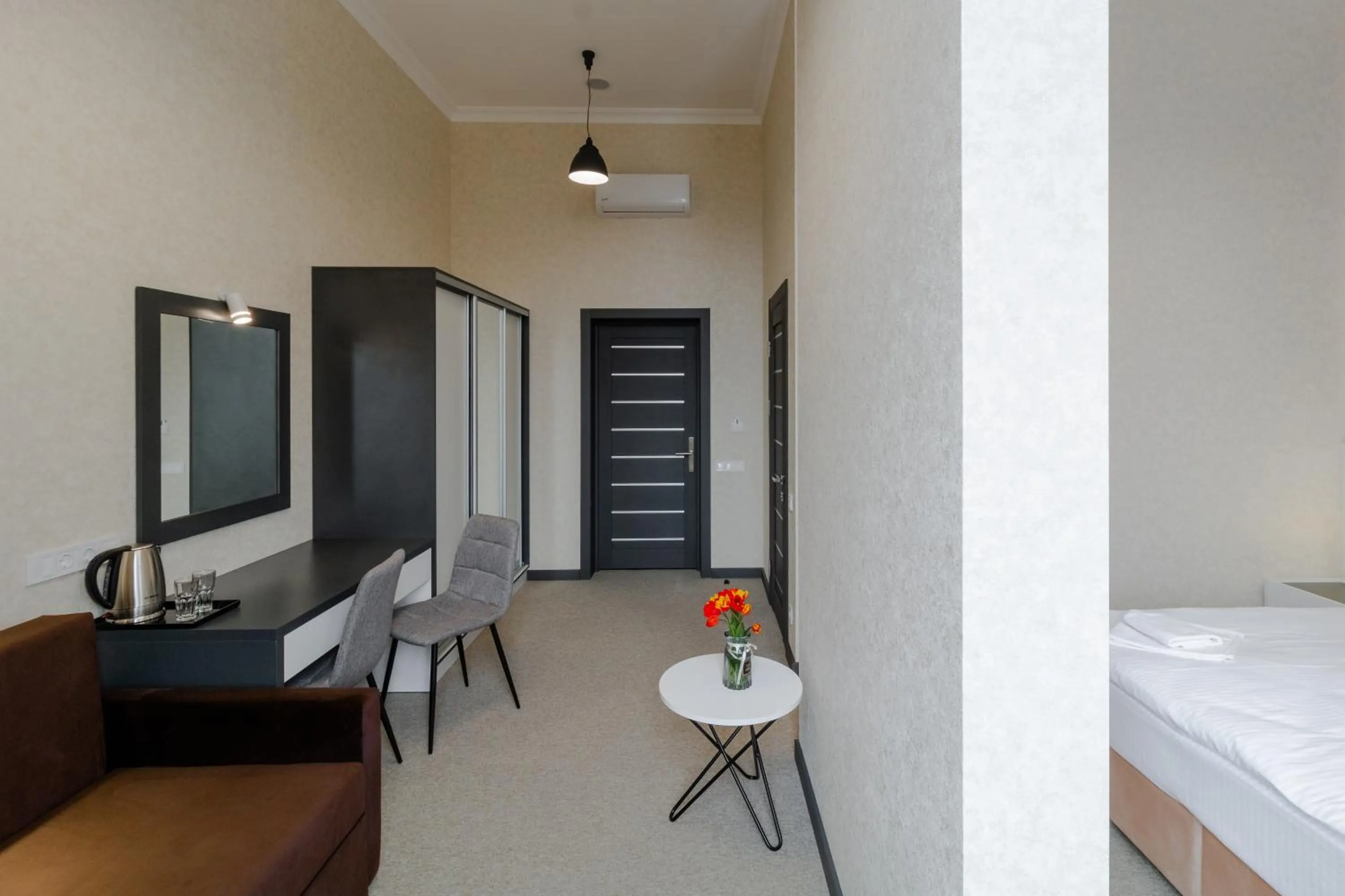 Seating area, Bed in Opera Passage Hotel & Apartments