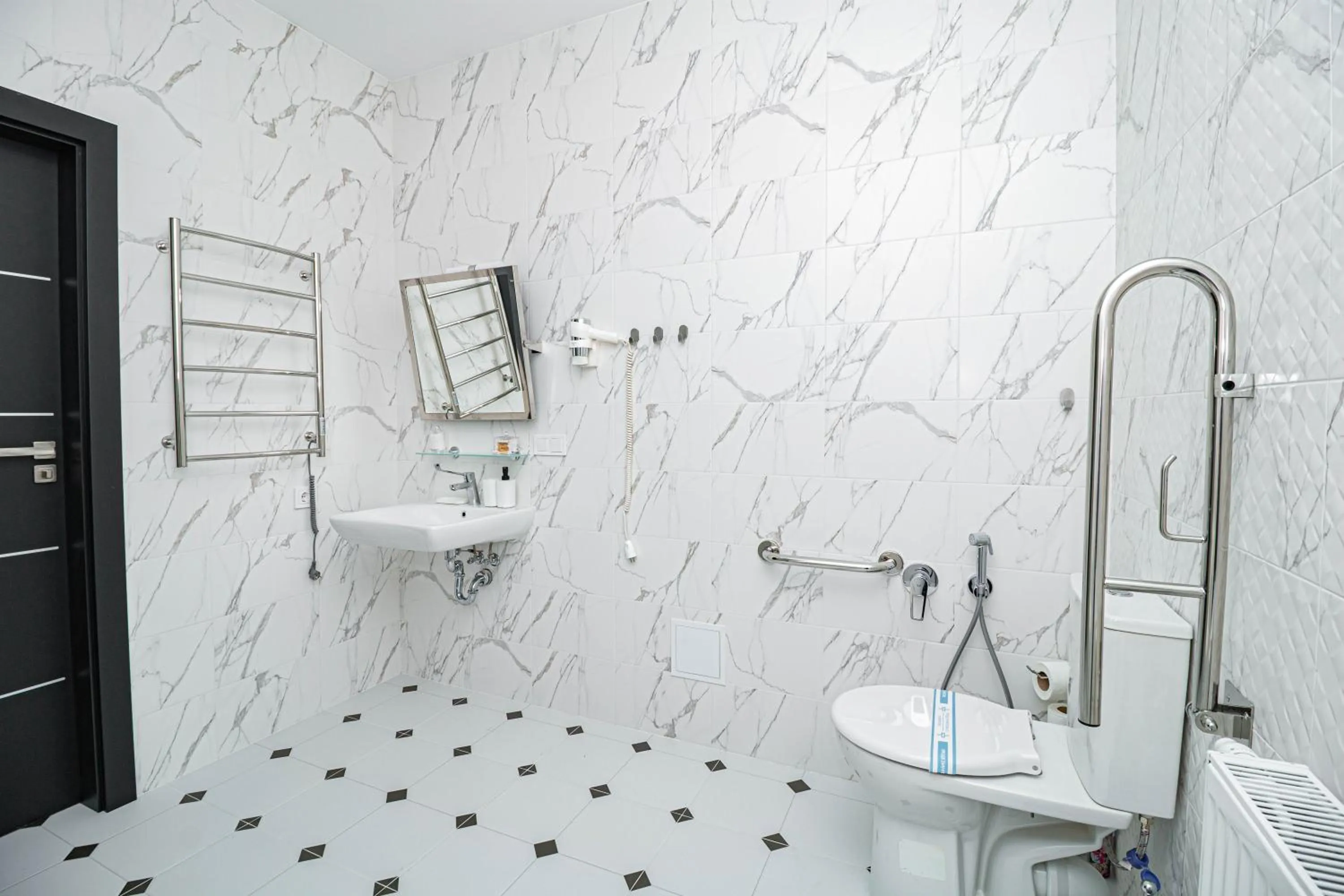 Toilet in Opera Passage Hotel & Apartments