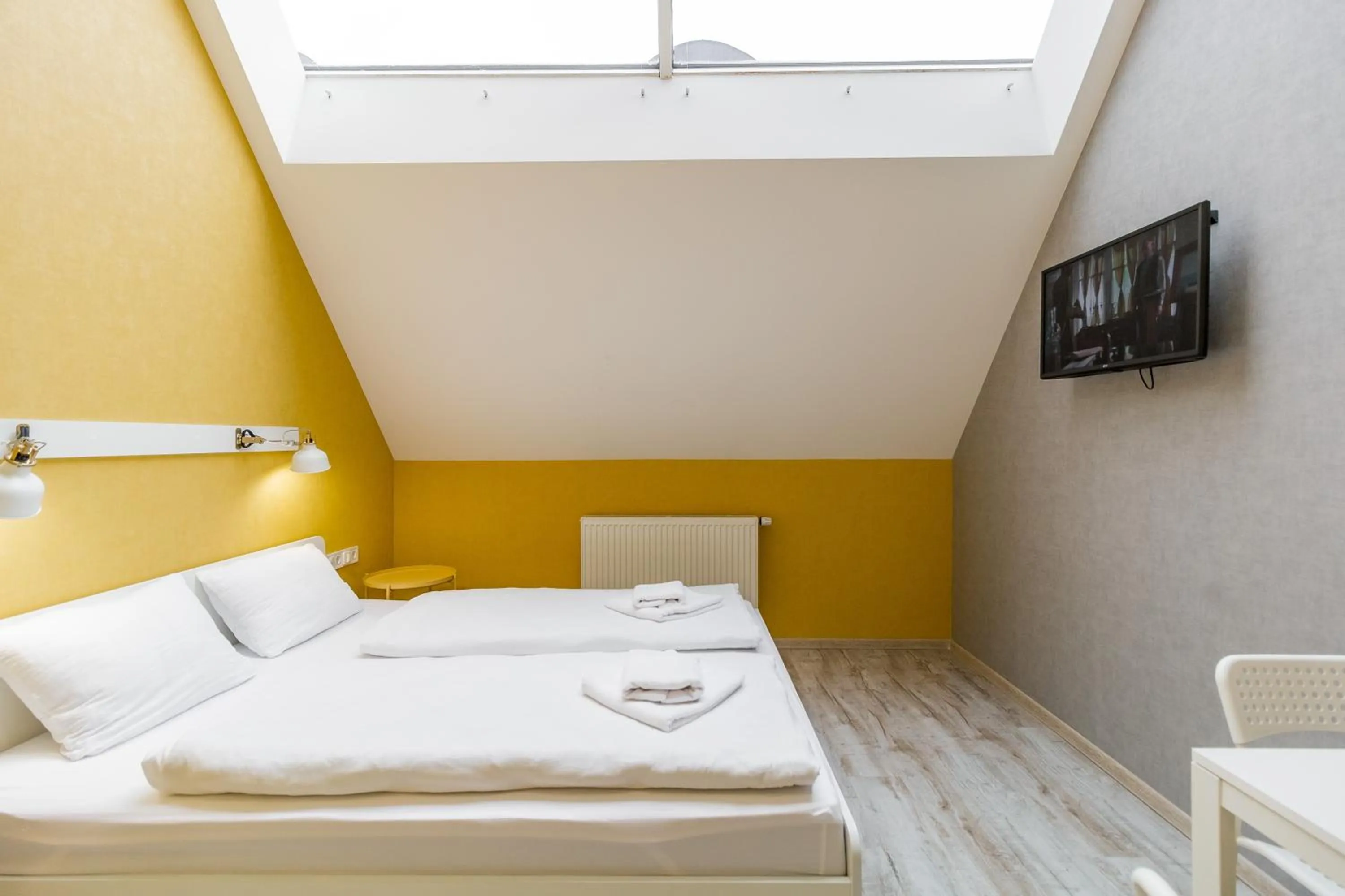 Bed in Opera Passage Hotel & Apartments