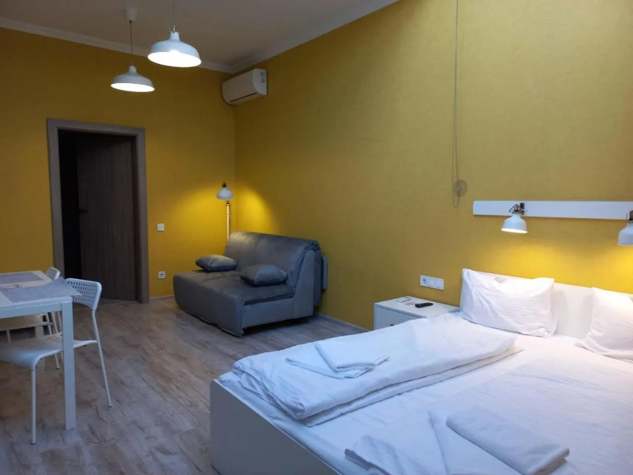 Bed in Opera Passage Hotel & Apartments