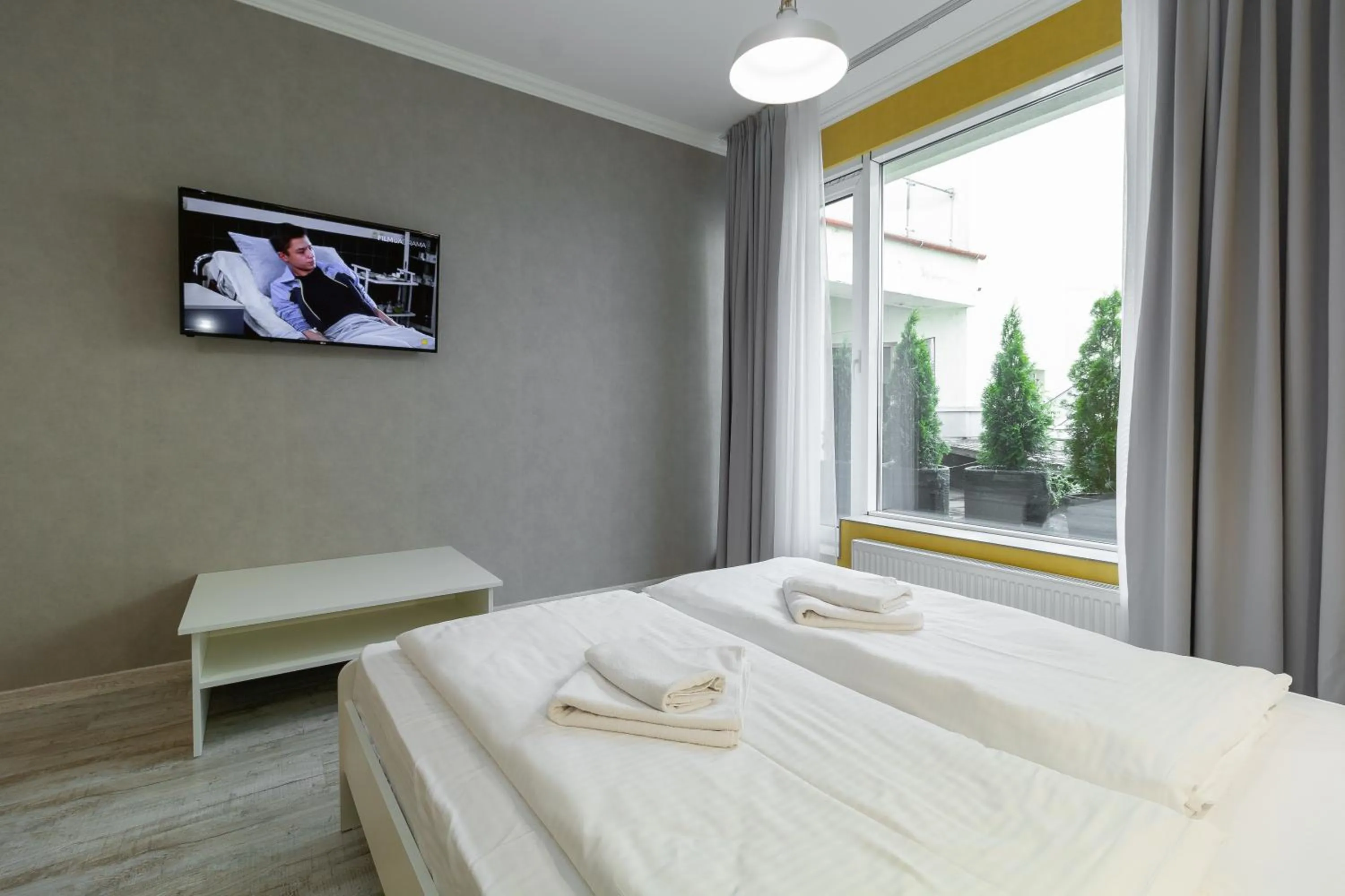 Bed in Opera Passage Hotel & Apartments