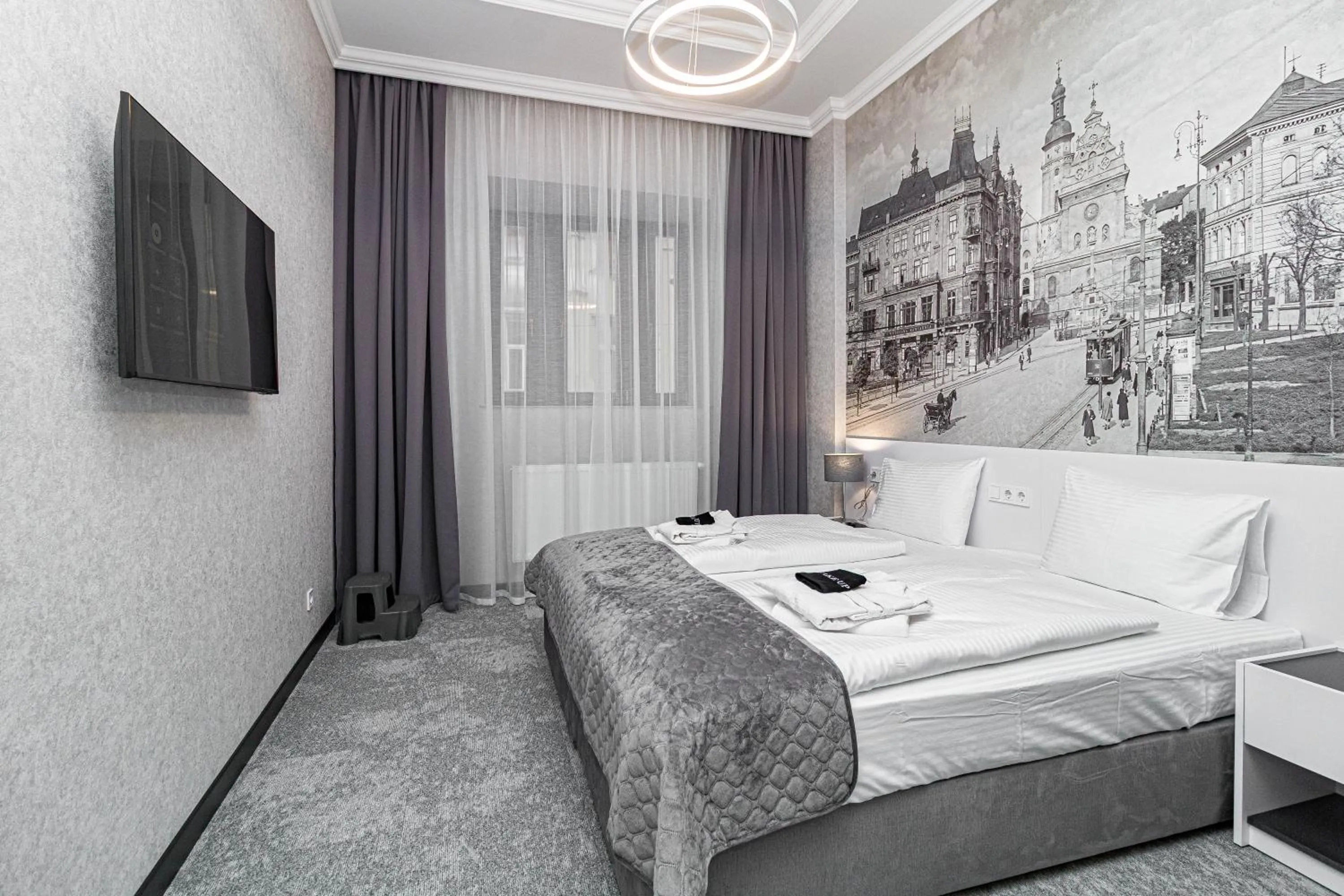 Bed in Opera Passage Hotel & Apartments