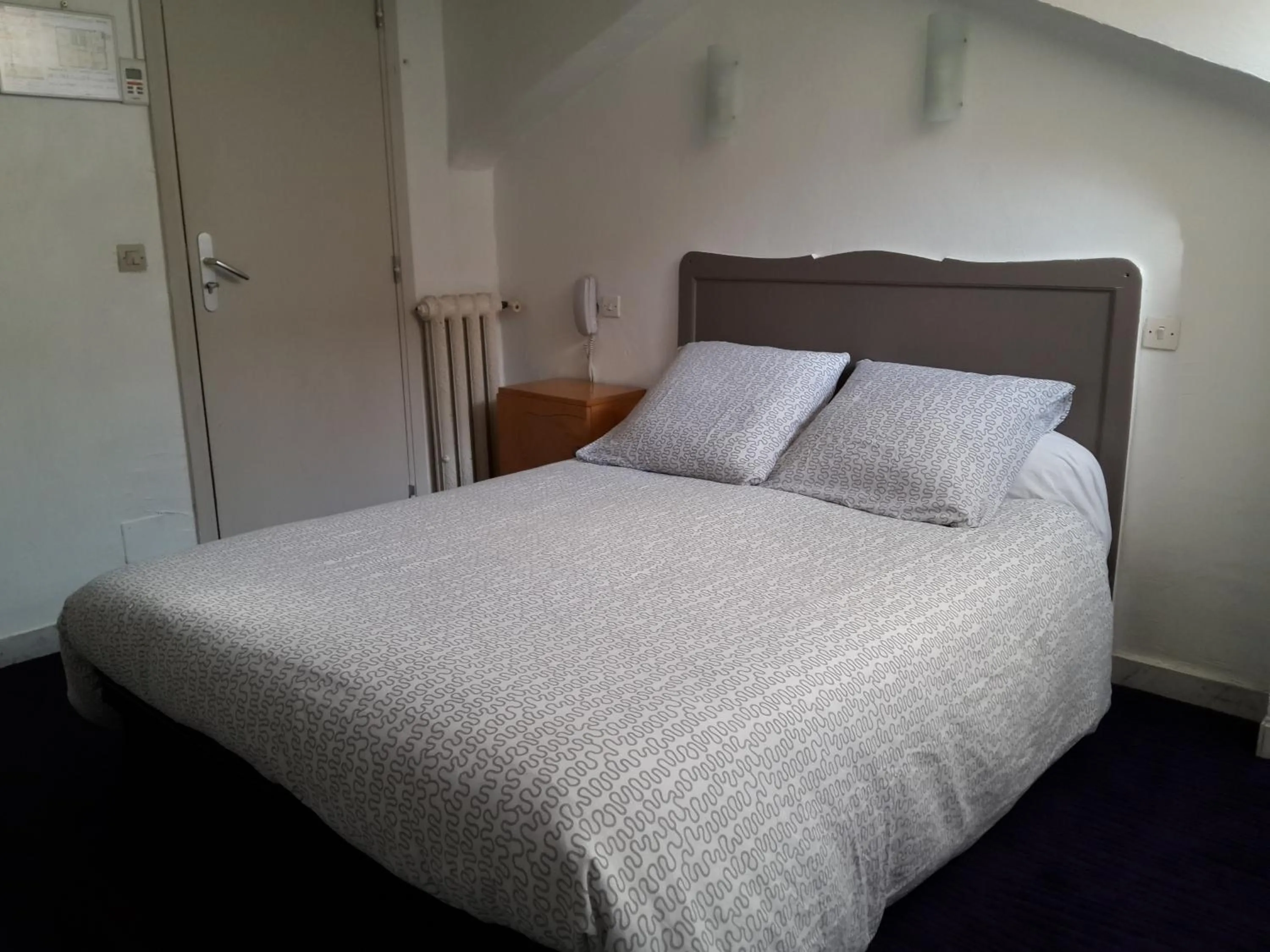 Bedroom in Hôtel Belle Meunière