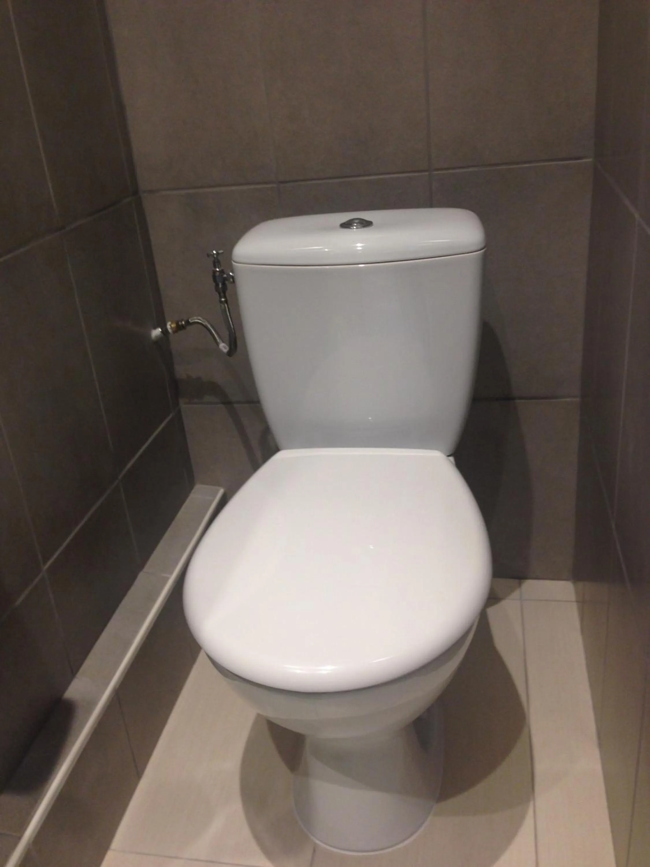 Toilet in Hôtel Belle Meunière