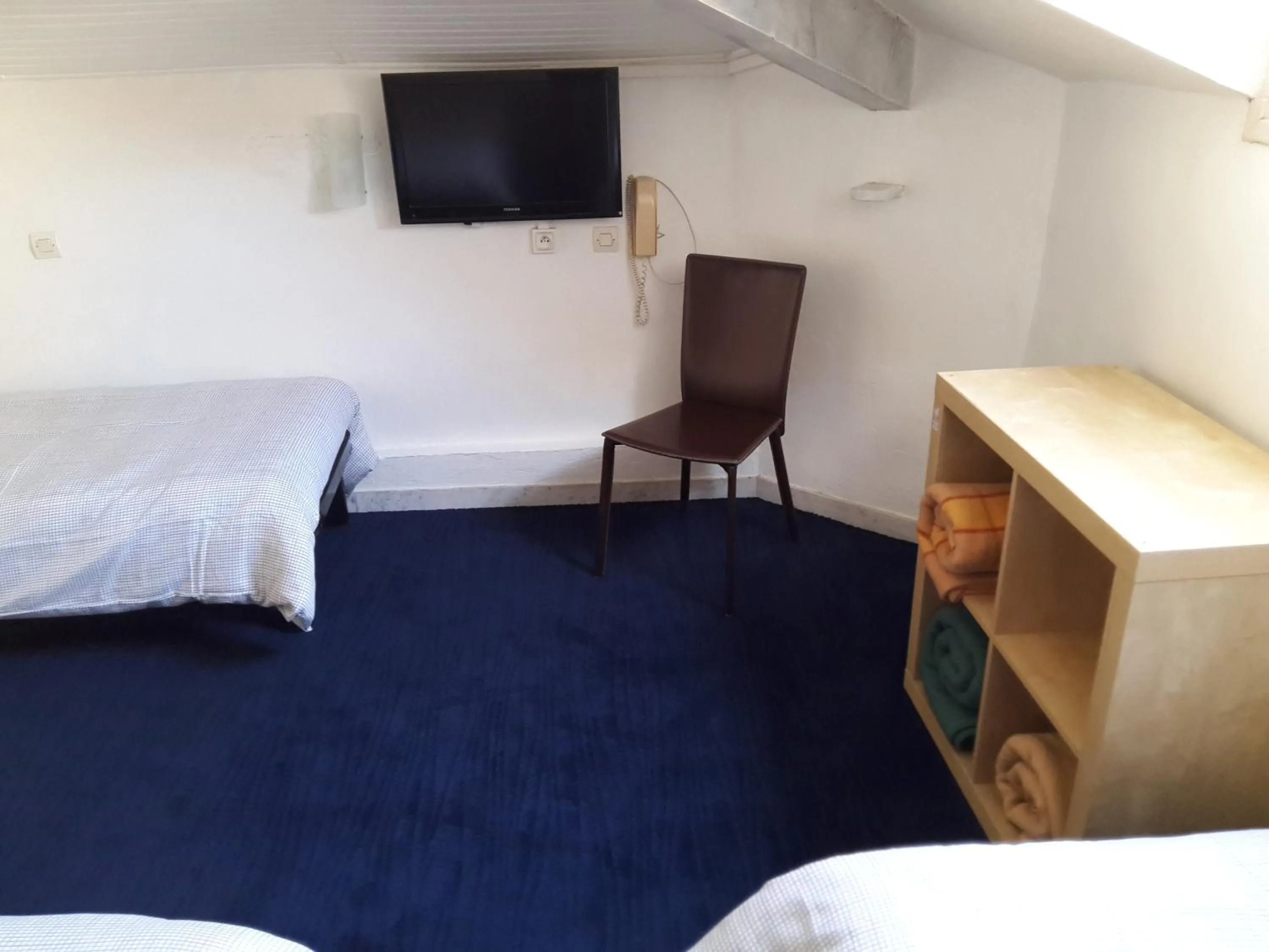 Bedroom in Hôtel Belle Meunière