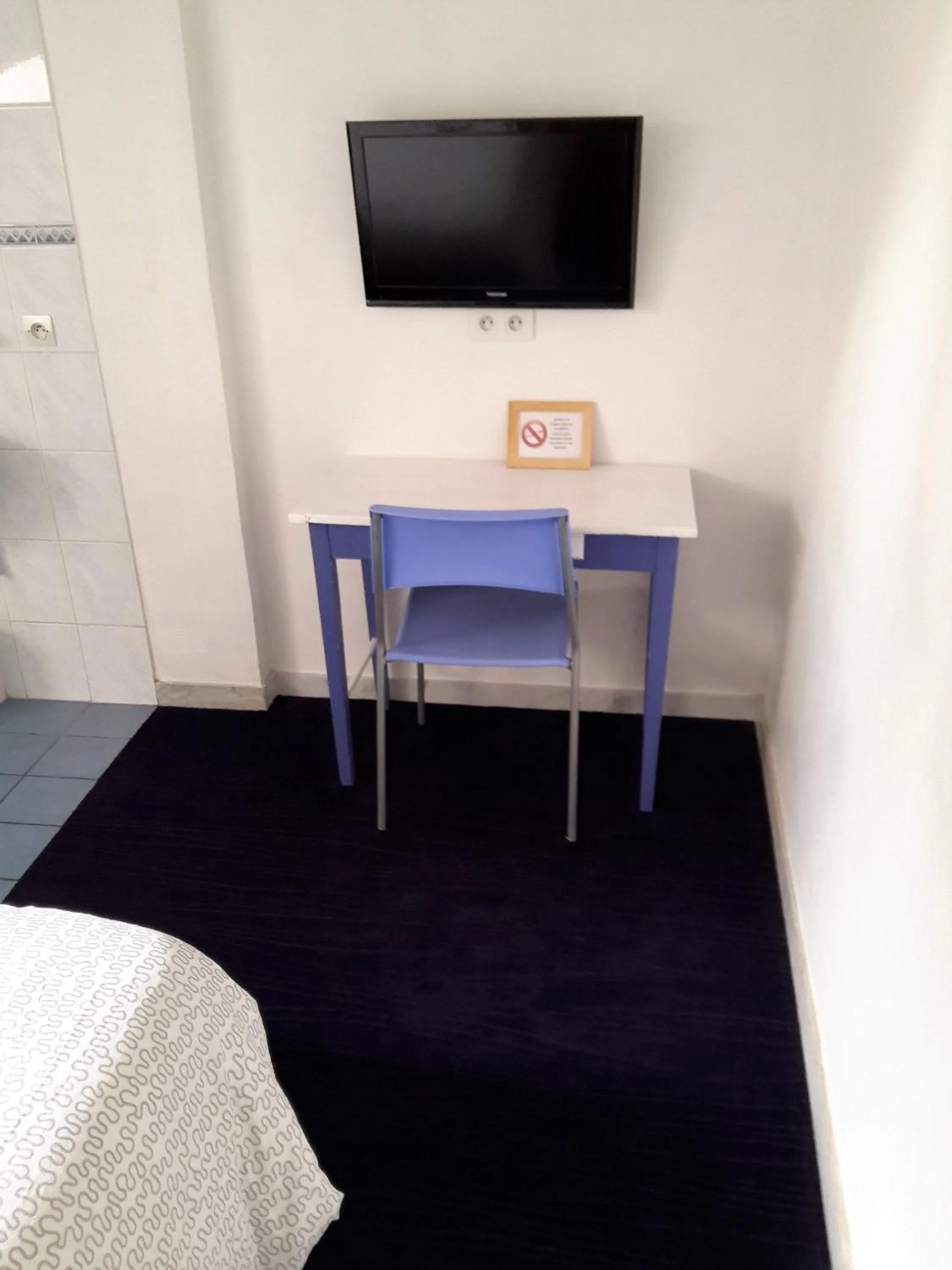 Bedroom in Hôtel Belle Meunière