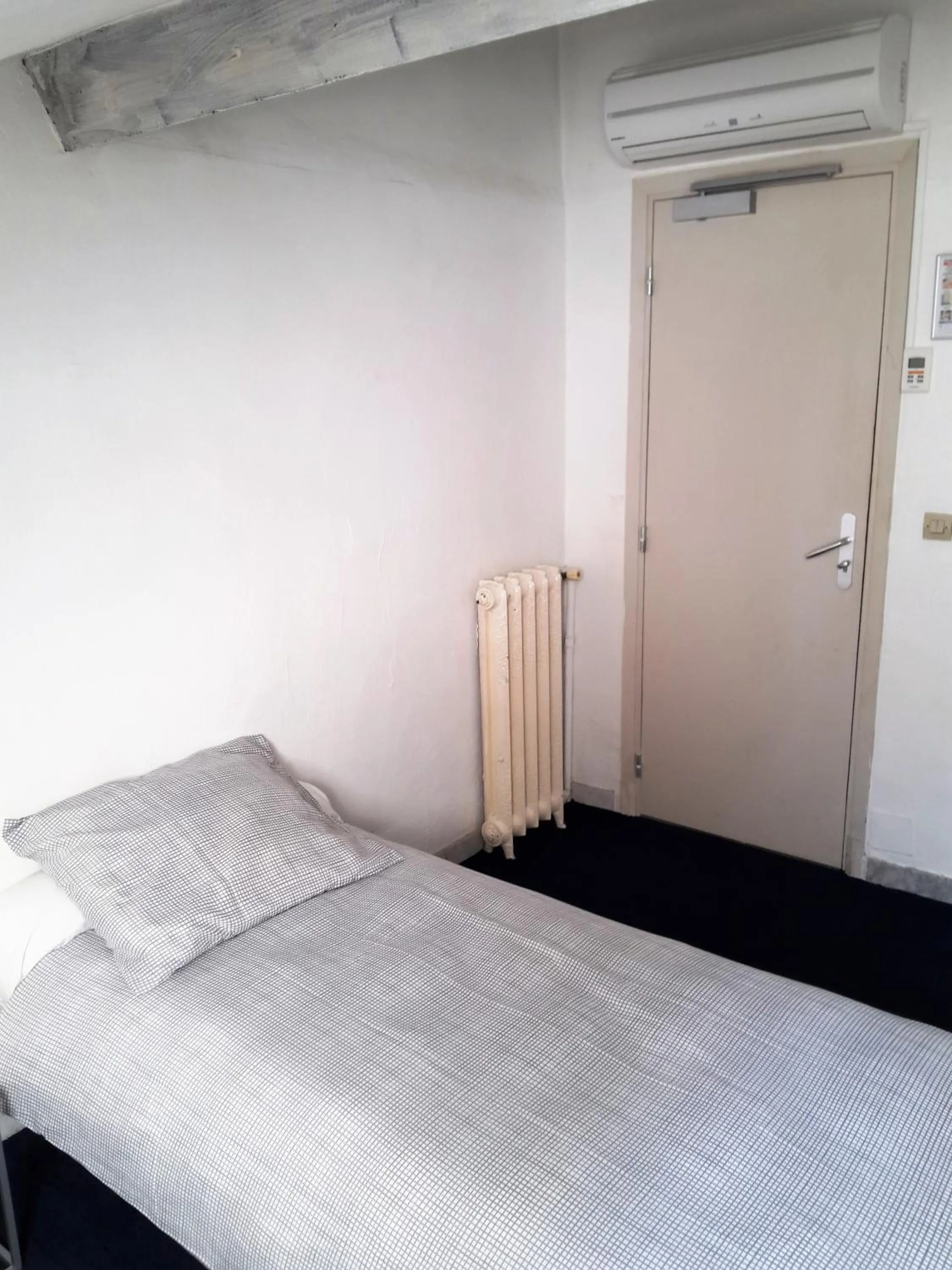 Bedroom in Hôtel Belle Meunière