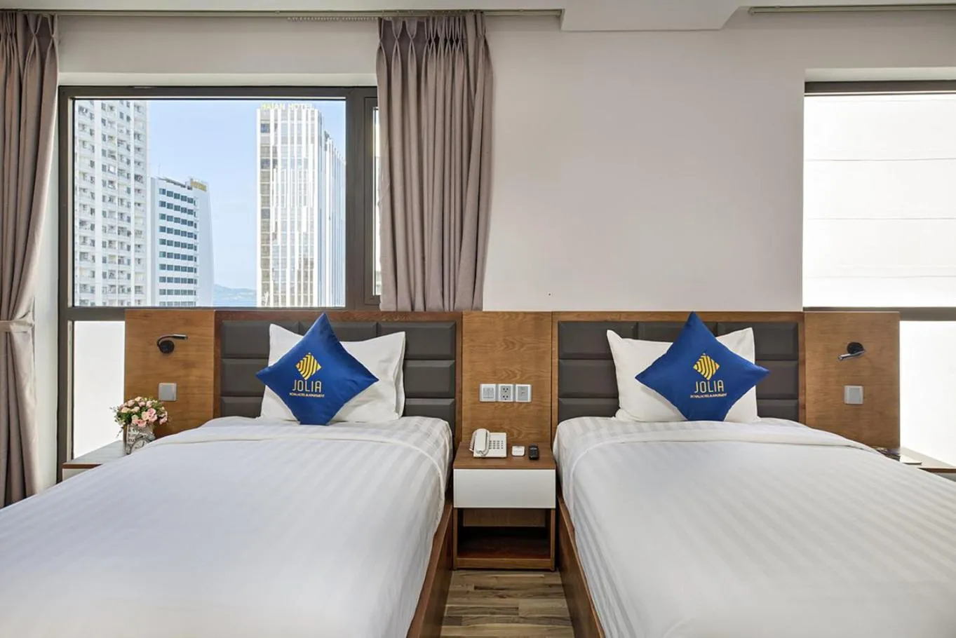 Bed in Jolia Hotel Danang Beach