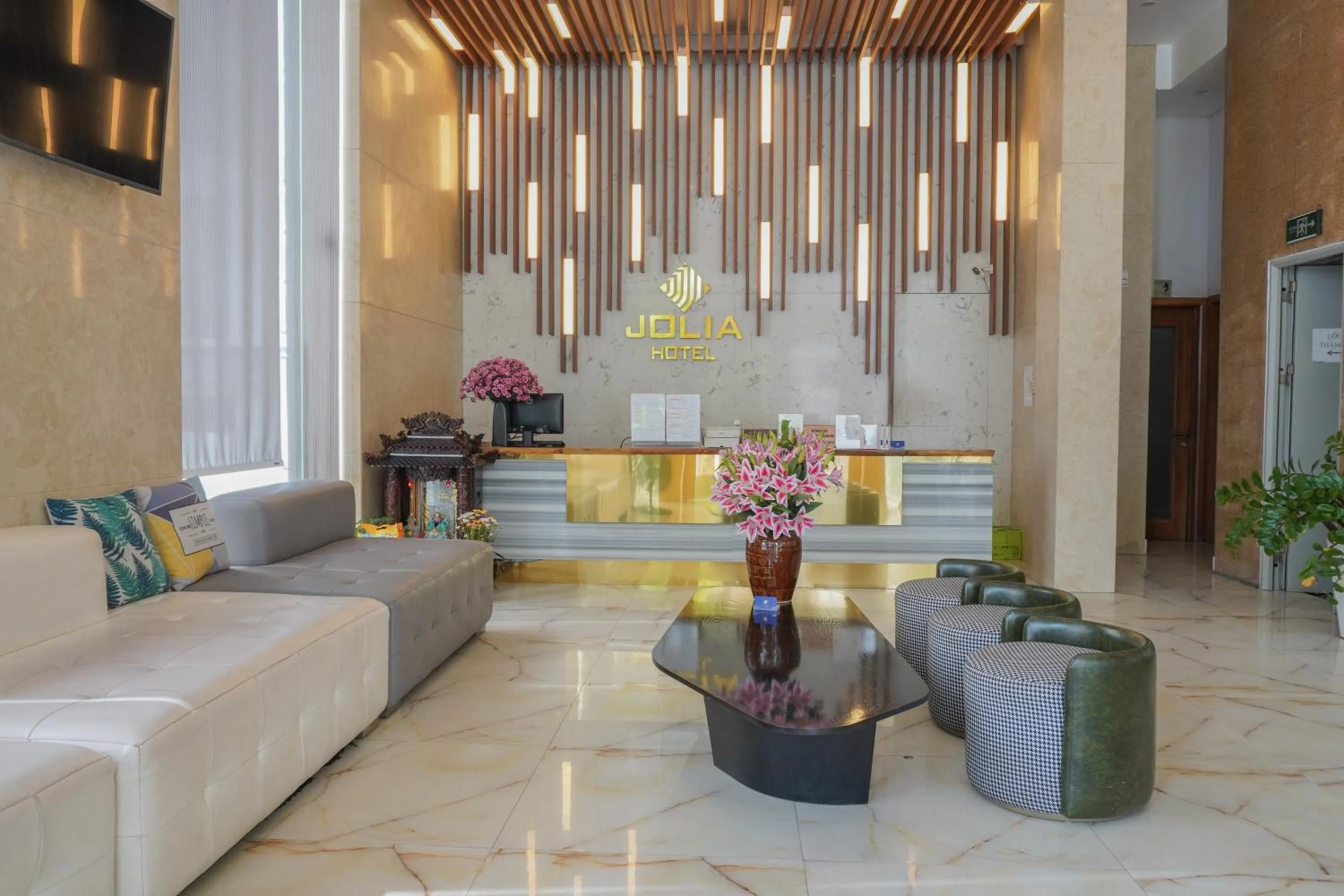 Communal lounge/ TV room in Jolia Hotel Danang Beach