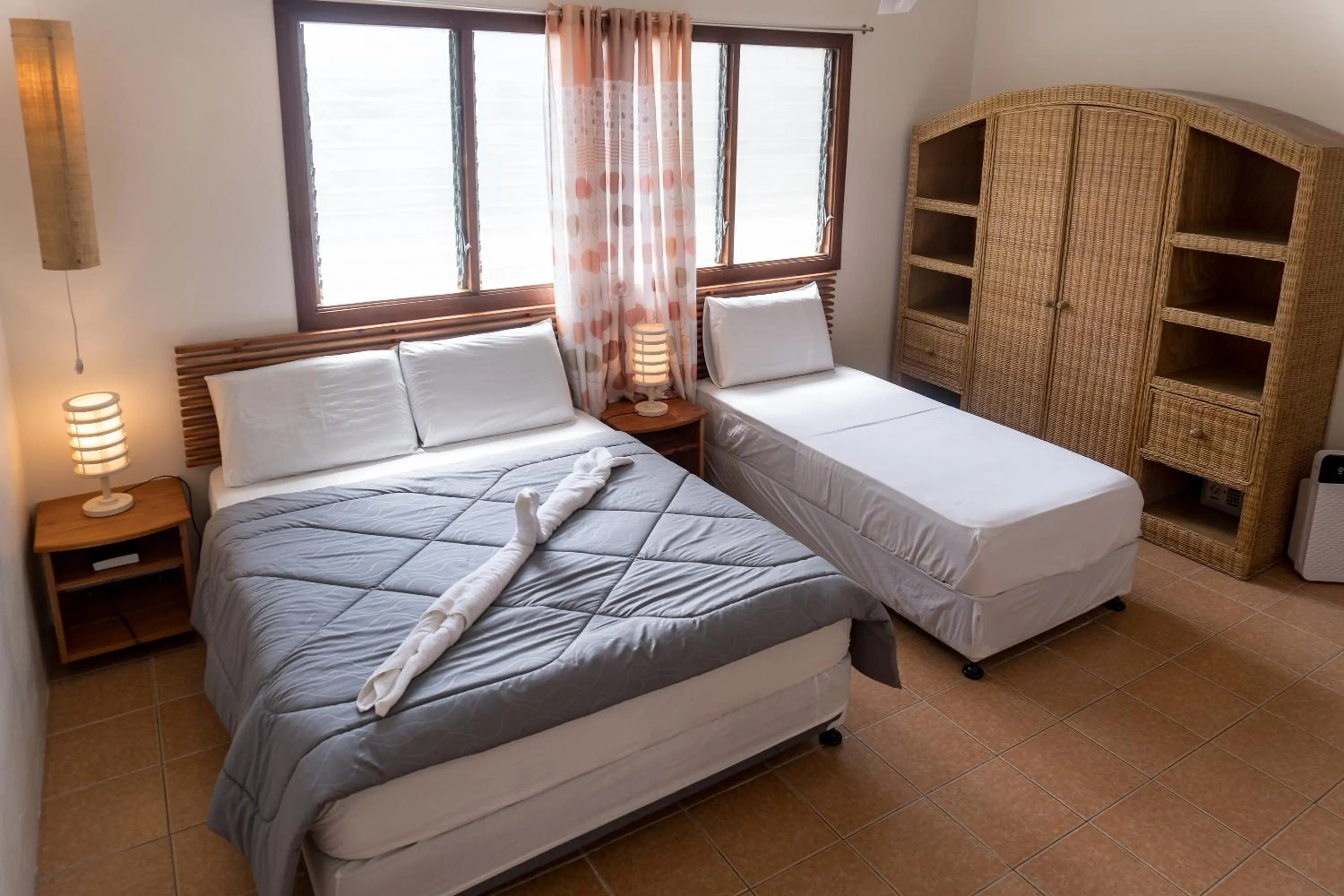 Photo of the whole room, Bed in Quo Vadis Dive Resort