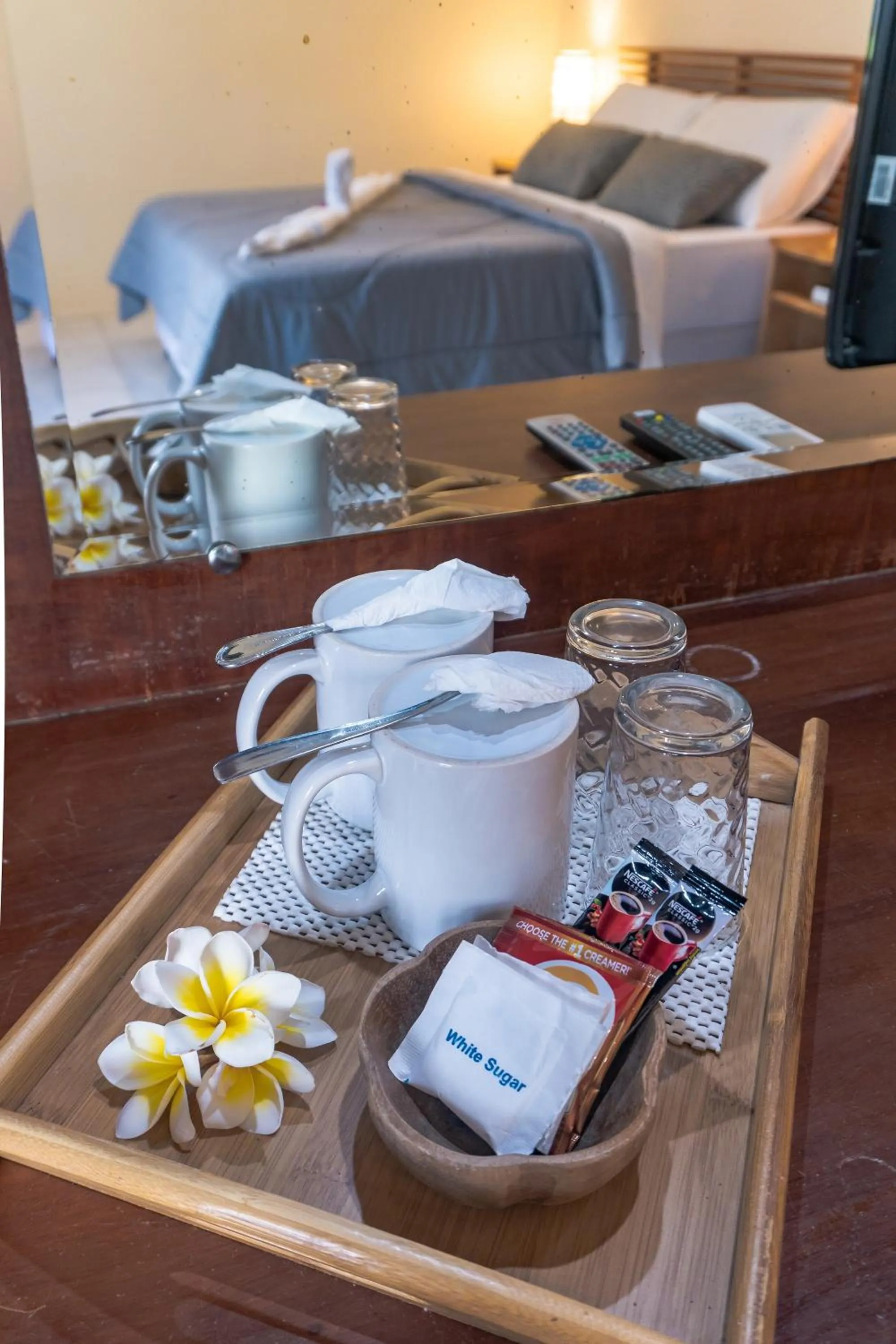 Bed in Quo Vadis Dive Resort