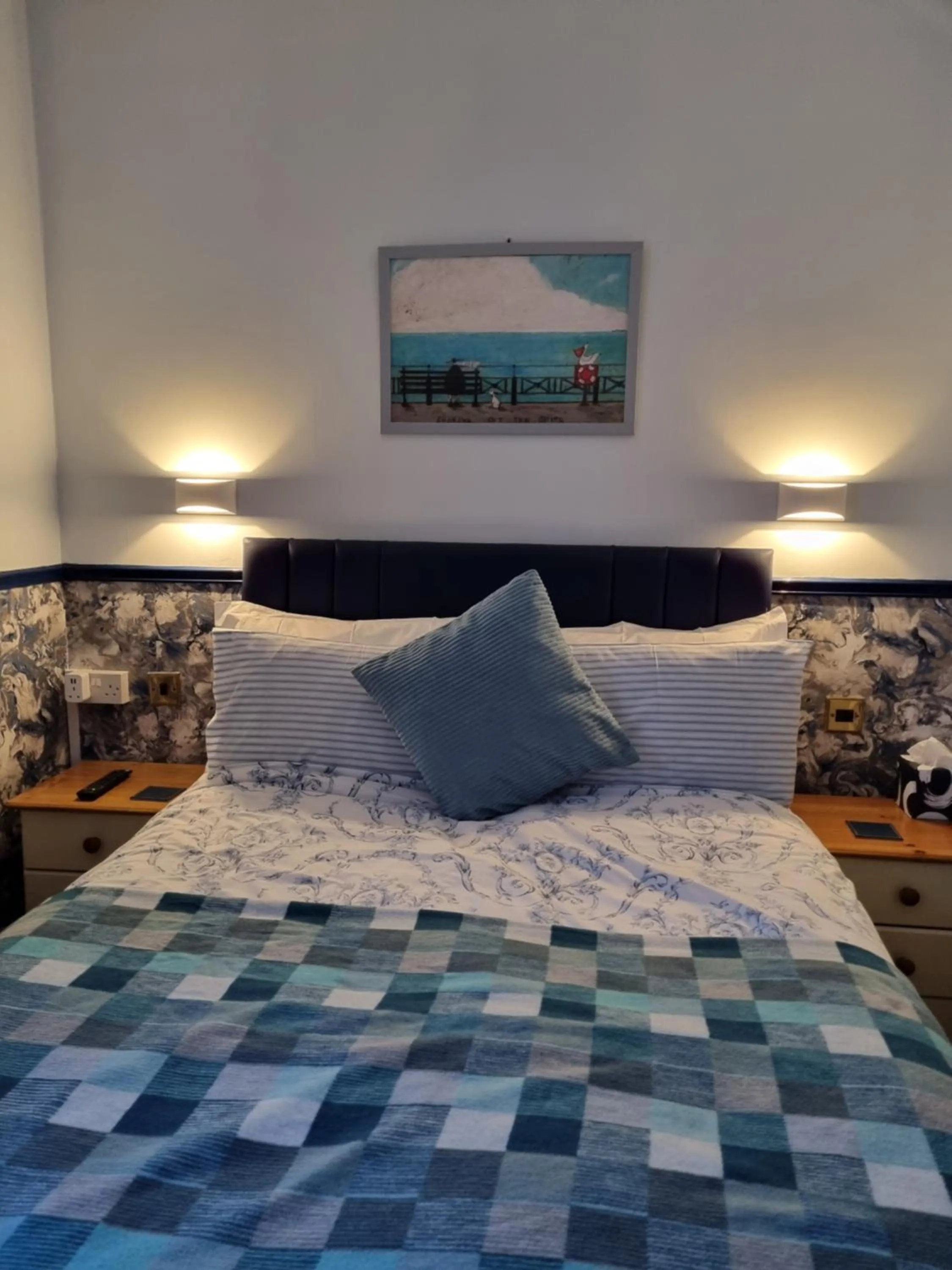 Bed in Sirocco Blues Guest House