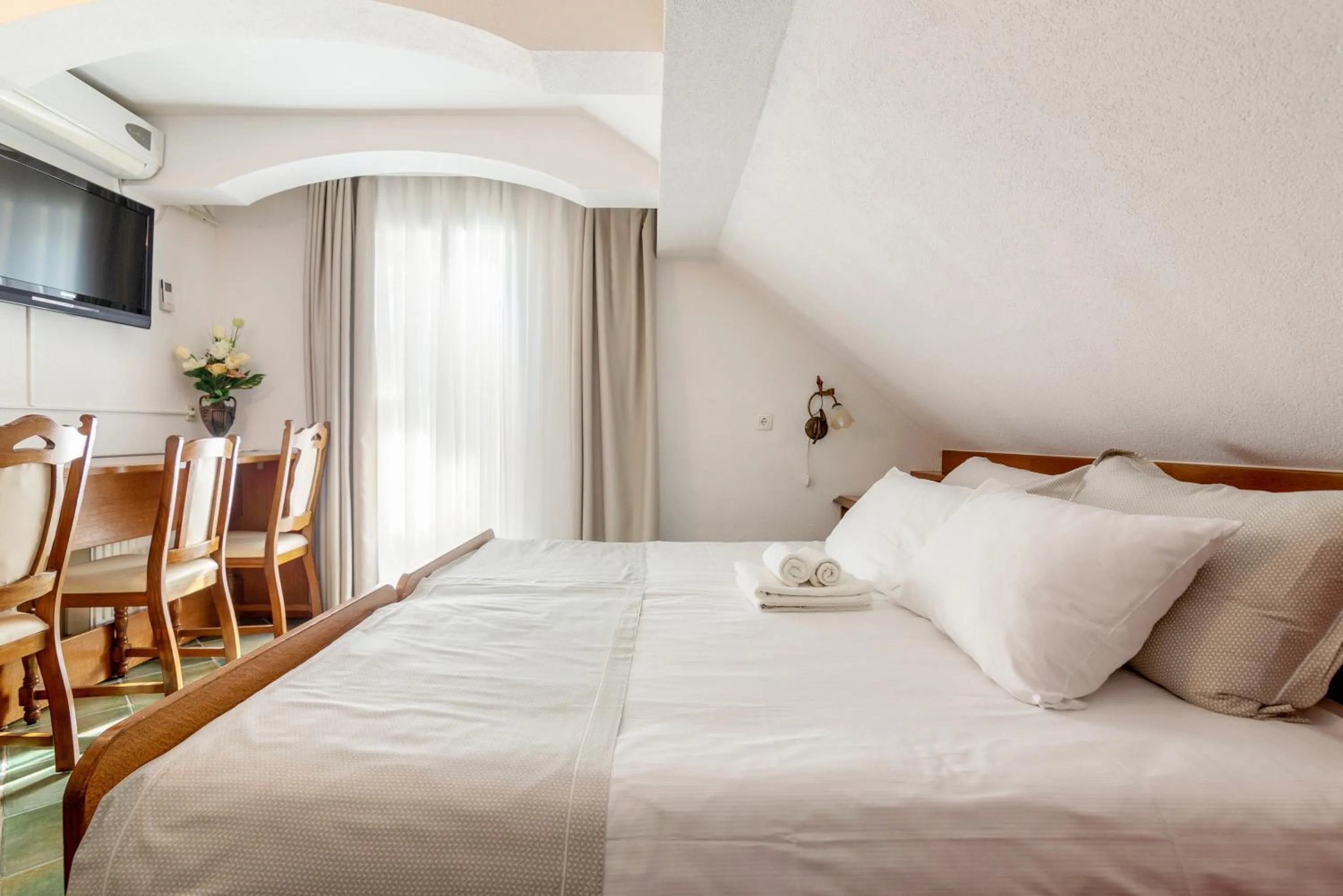 Bed in Jagodic Garni Hotel