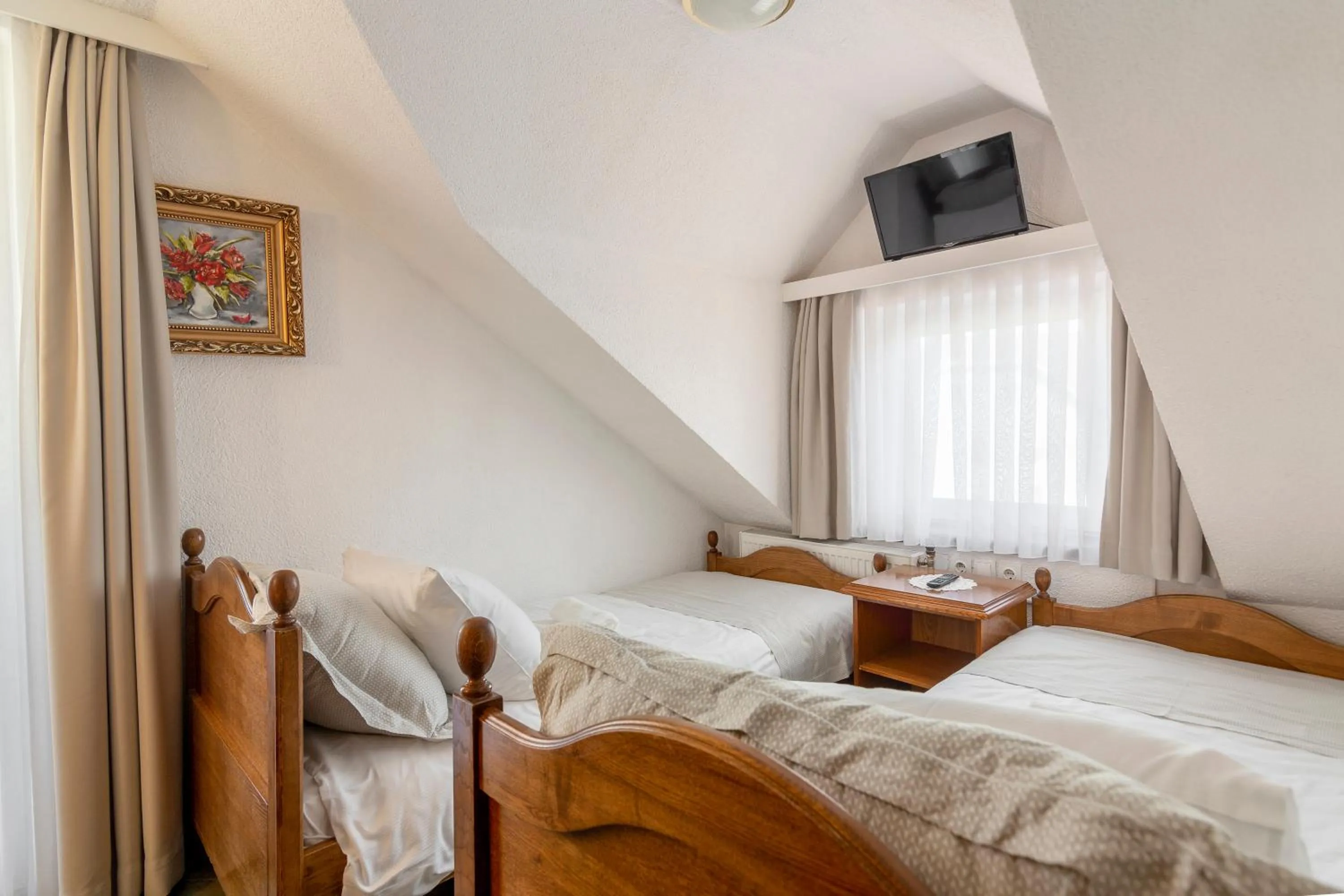 Bed in Jagodic Garni Hotel