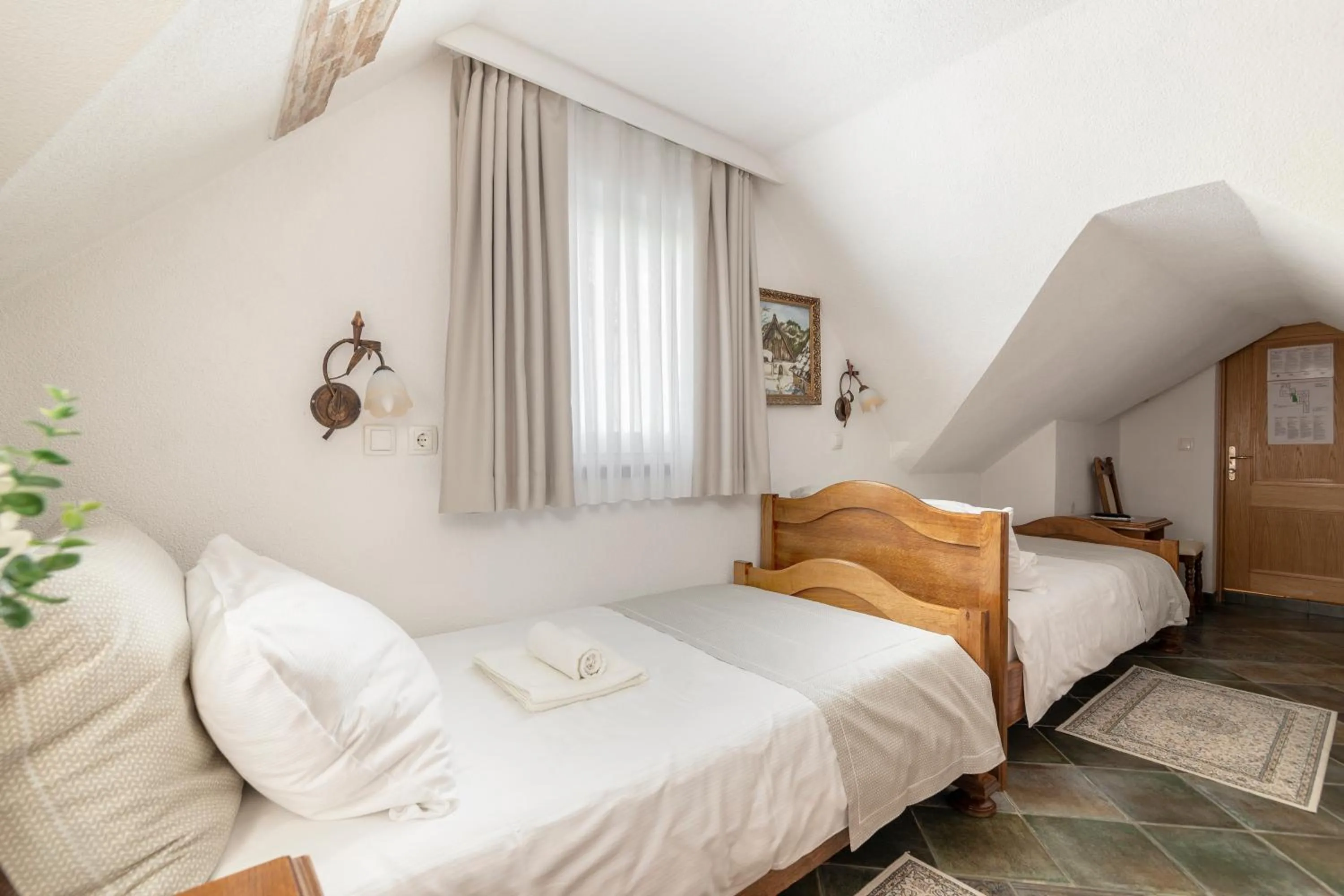 Bed in Jagodic Garni Hotel