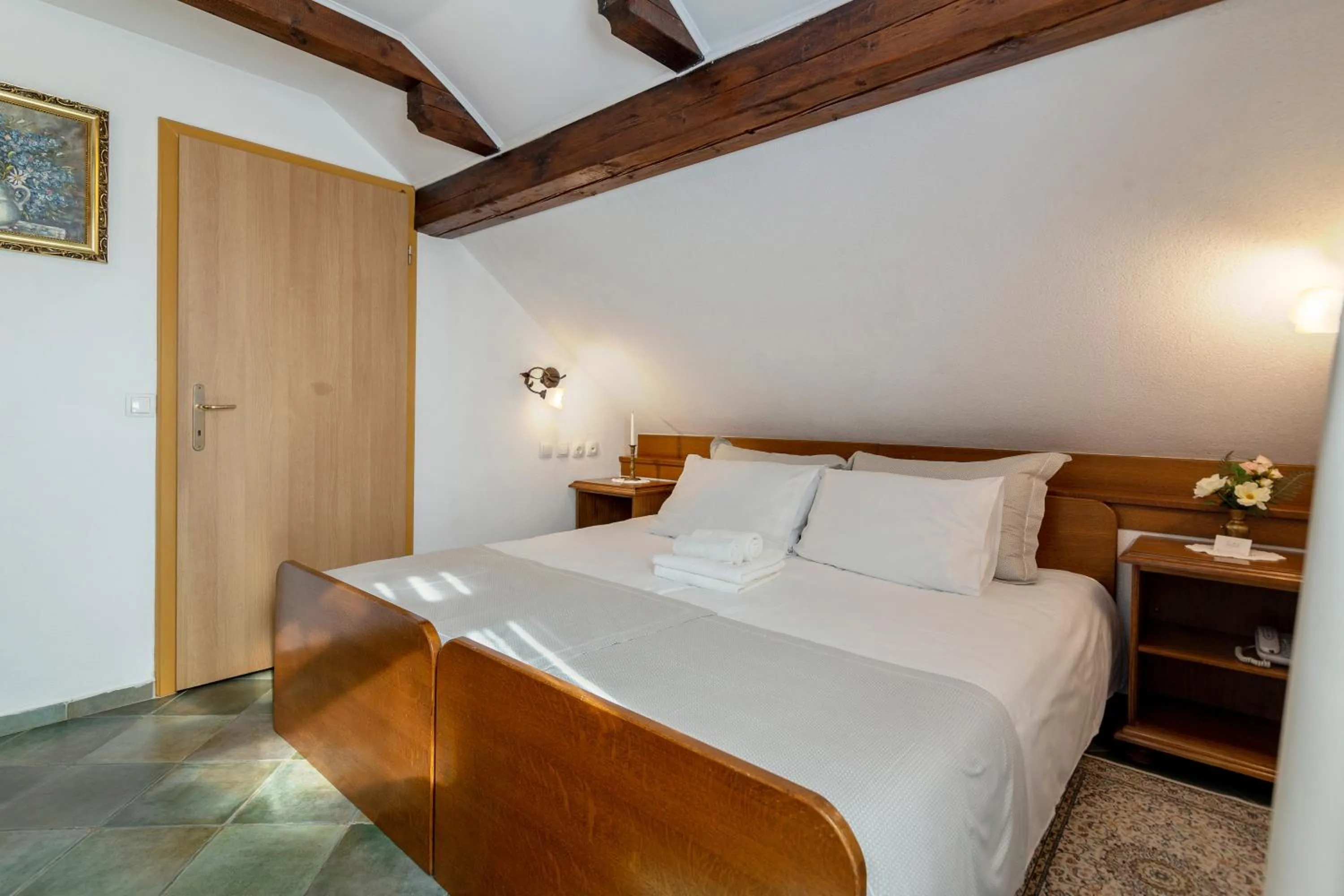 Bed in Jagodic Garni Hotel