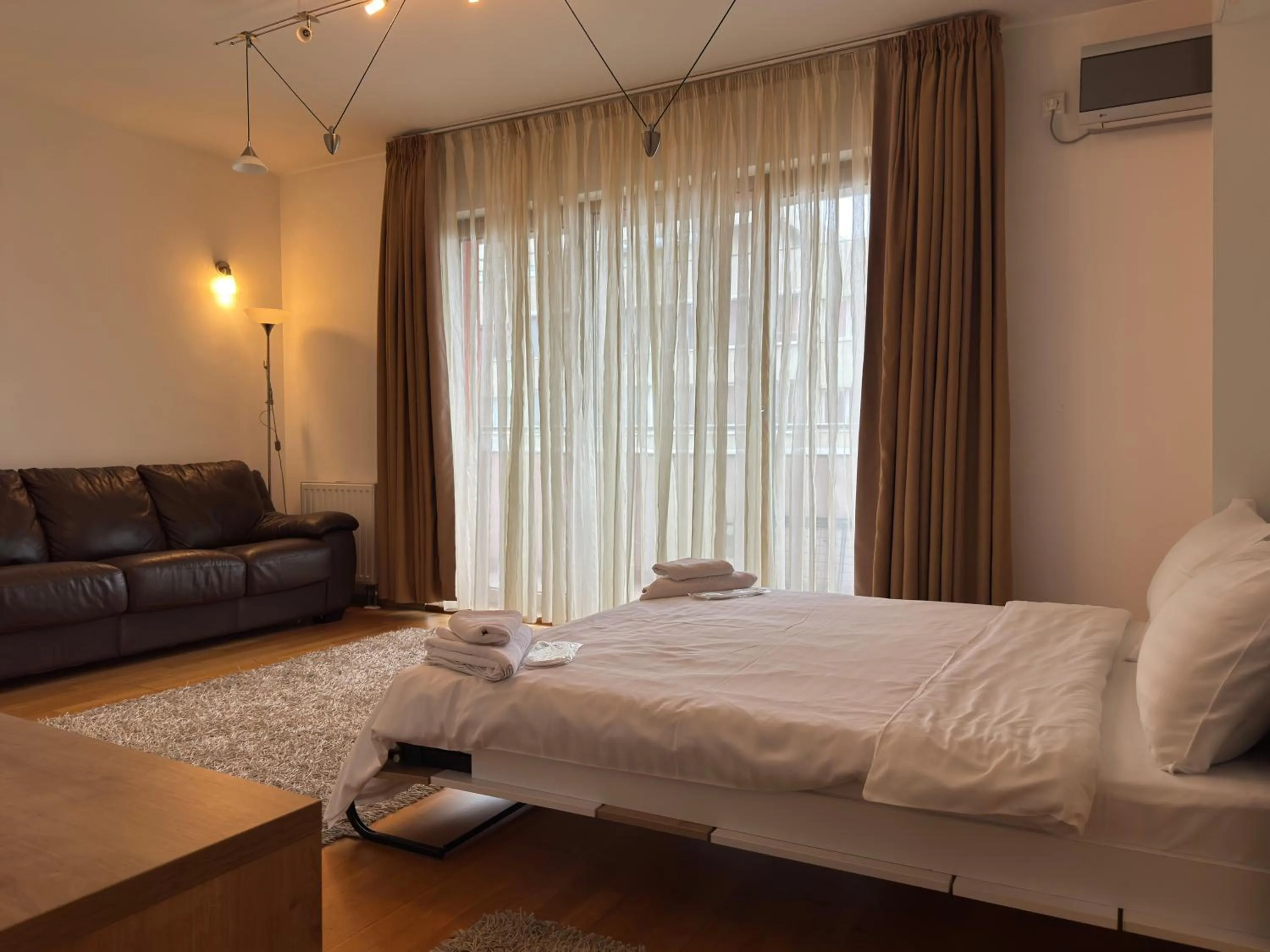 Bed in Monte Carlo Palace Suites